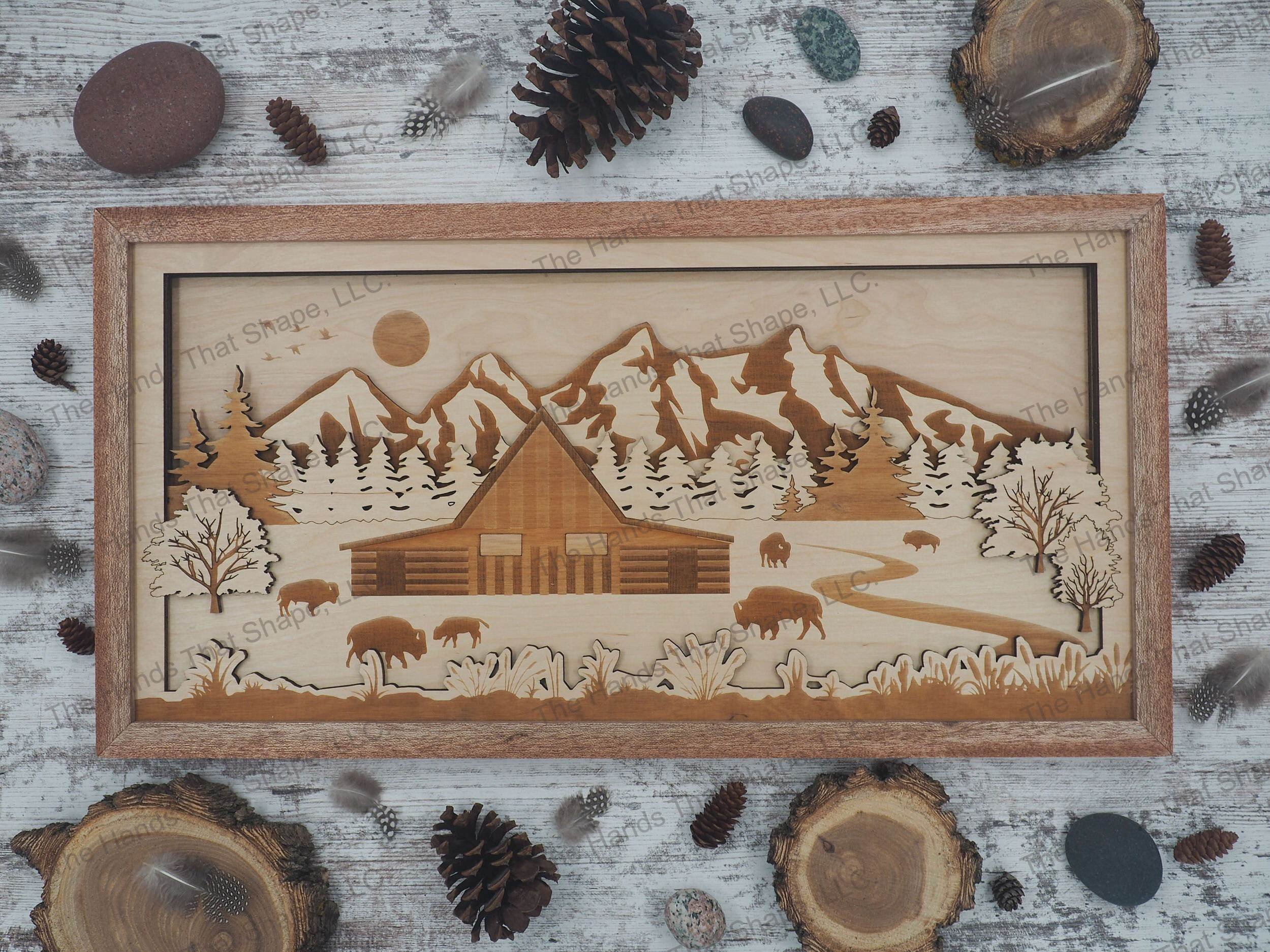 3D shadow box showcasing an old weathered barn, bison herd, pine forest and a majestic mountain range.