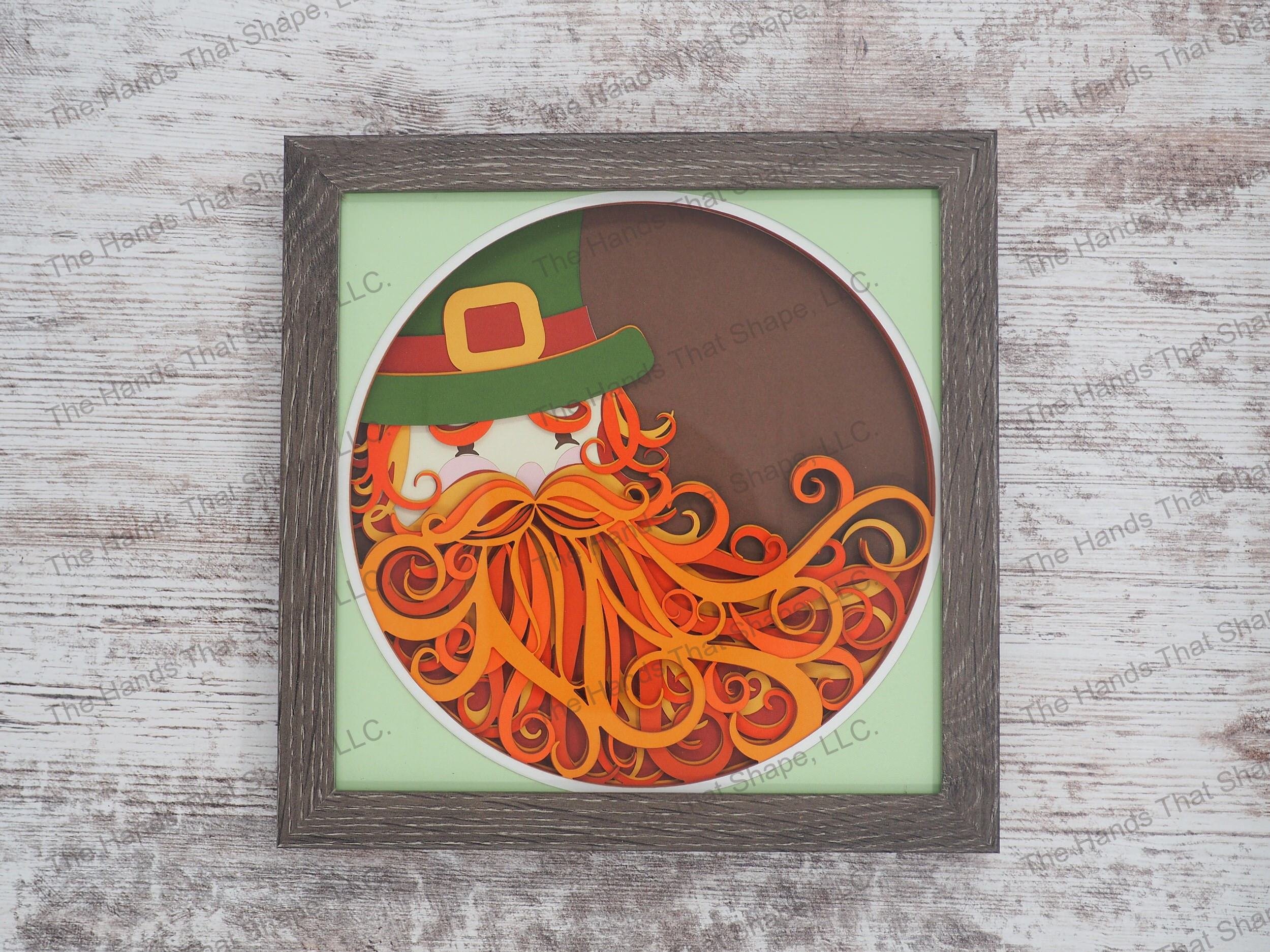 The “Leprechaun” shadow box features a leprechaun with his big bushy beard and gold buckled top hat classic to Irish folklore.