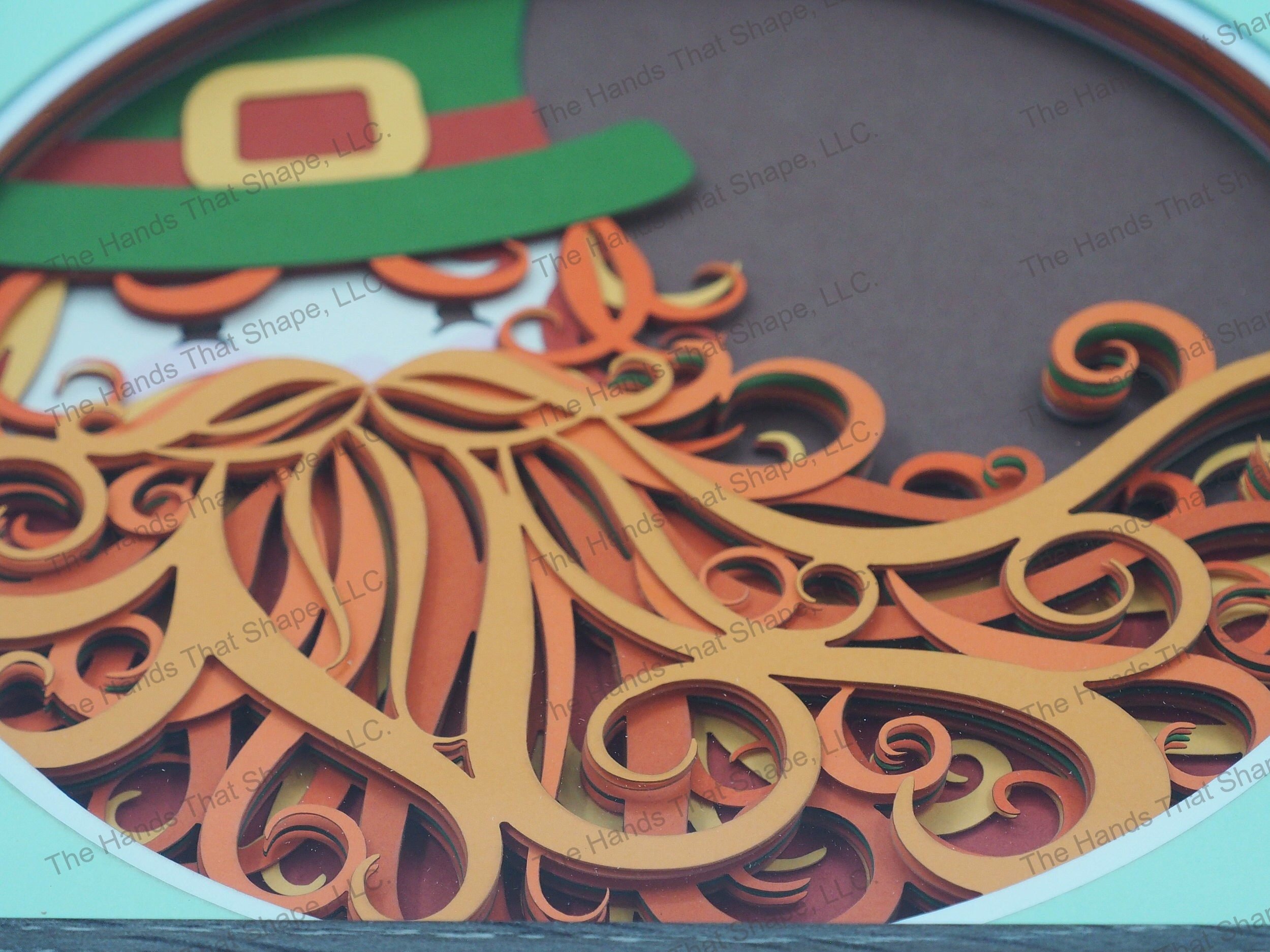The “Leprechaun” shadow box features a leprechaun with his big bushy beard and gold buckled top hat classic to Irish folklore.