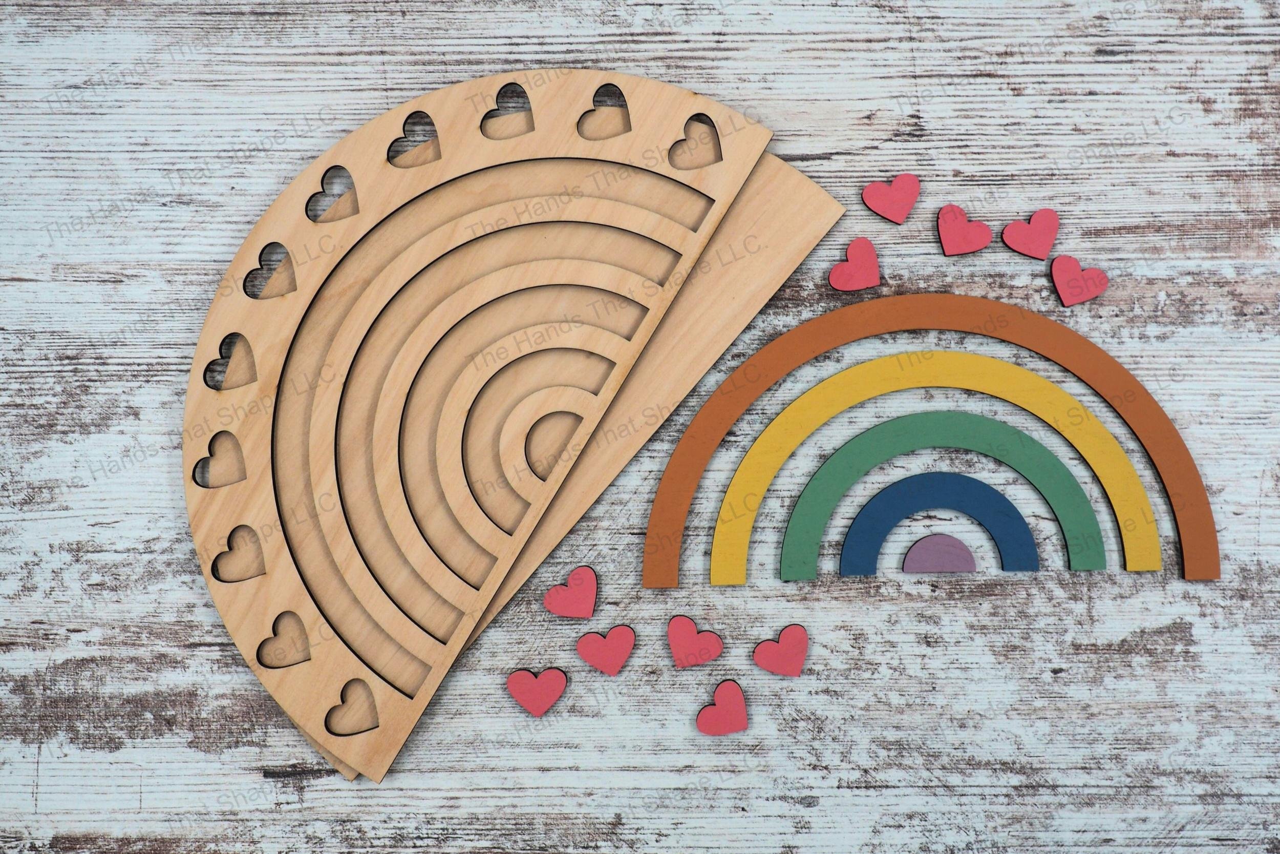 Laser ready file featuring a rainbow of hearts 18-piece wood inlay art piece, with commercial license for the physical products, perfect for paint parties.