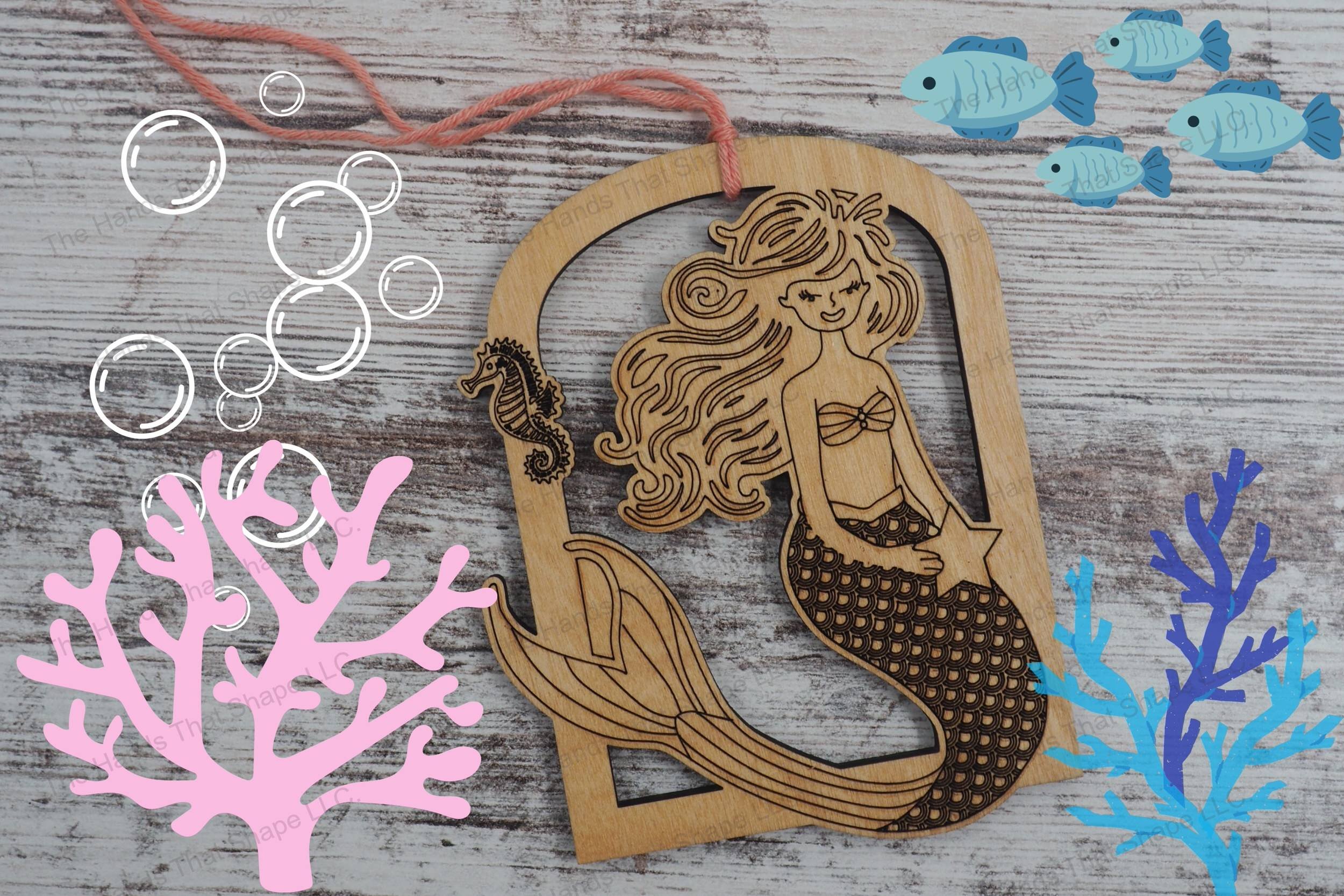 Craft a magical underwater-themed ornament with our laser-ready file featuring a detailed mermaid and seahorse, perfect for creating enchanting decorations.