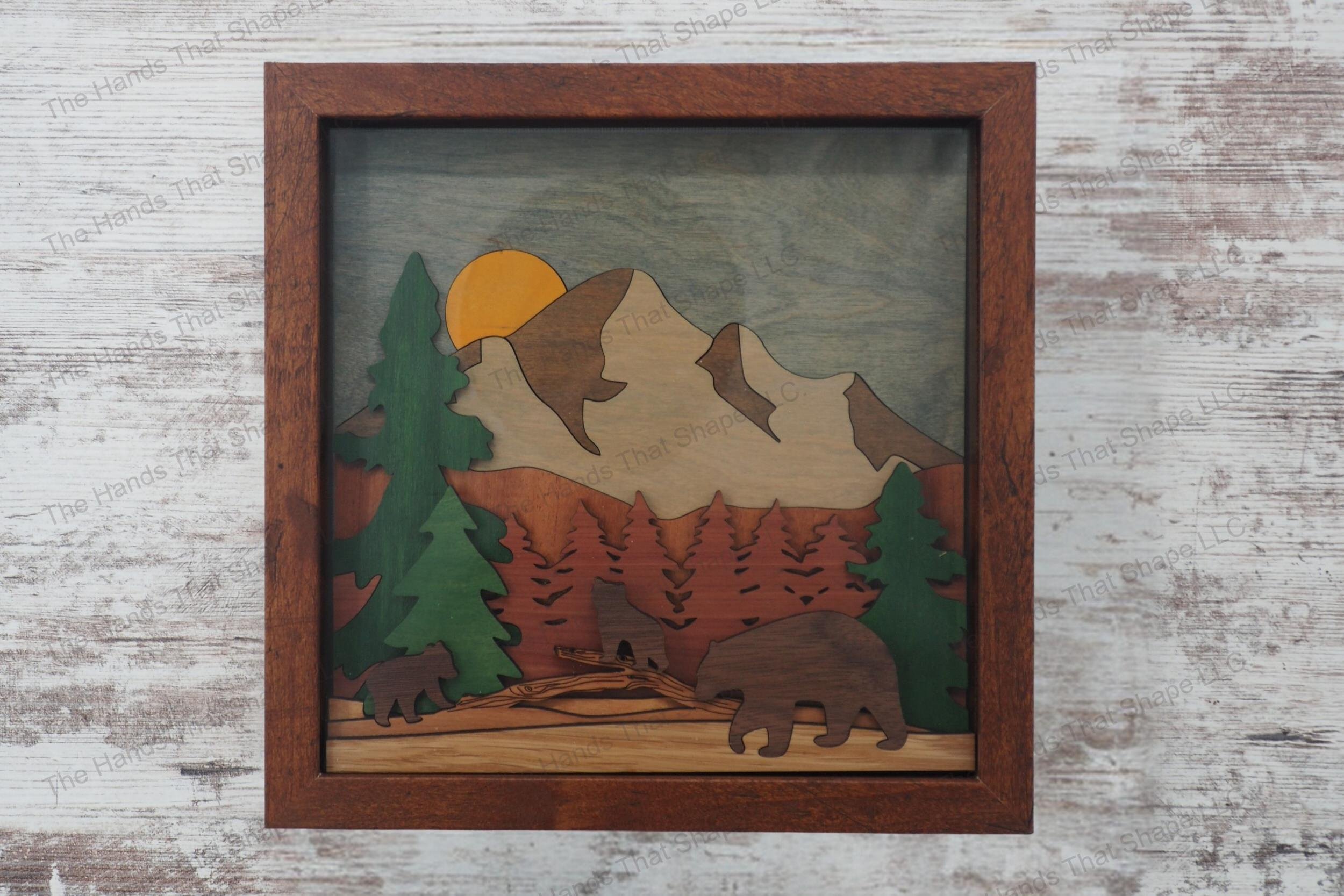 Craft a stunning 3D inlay art piece with our laser-ready design featuring a bear family in a forest, perfect for shadowbox displays or as a desktop decoration.