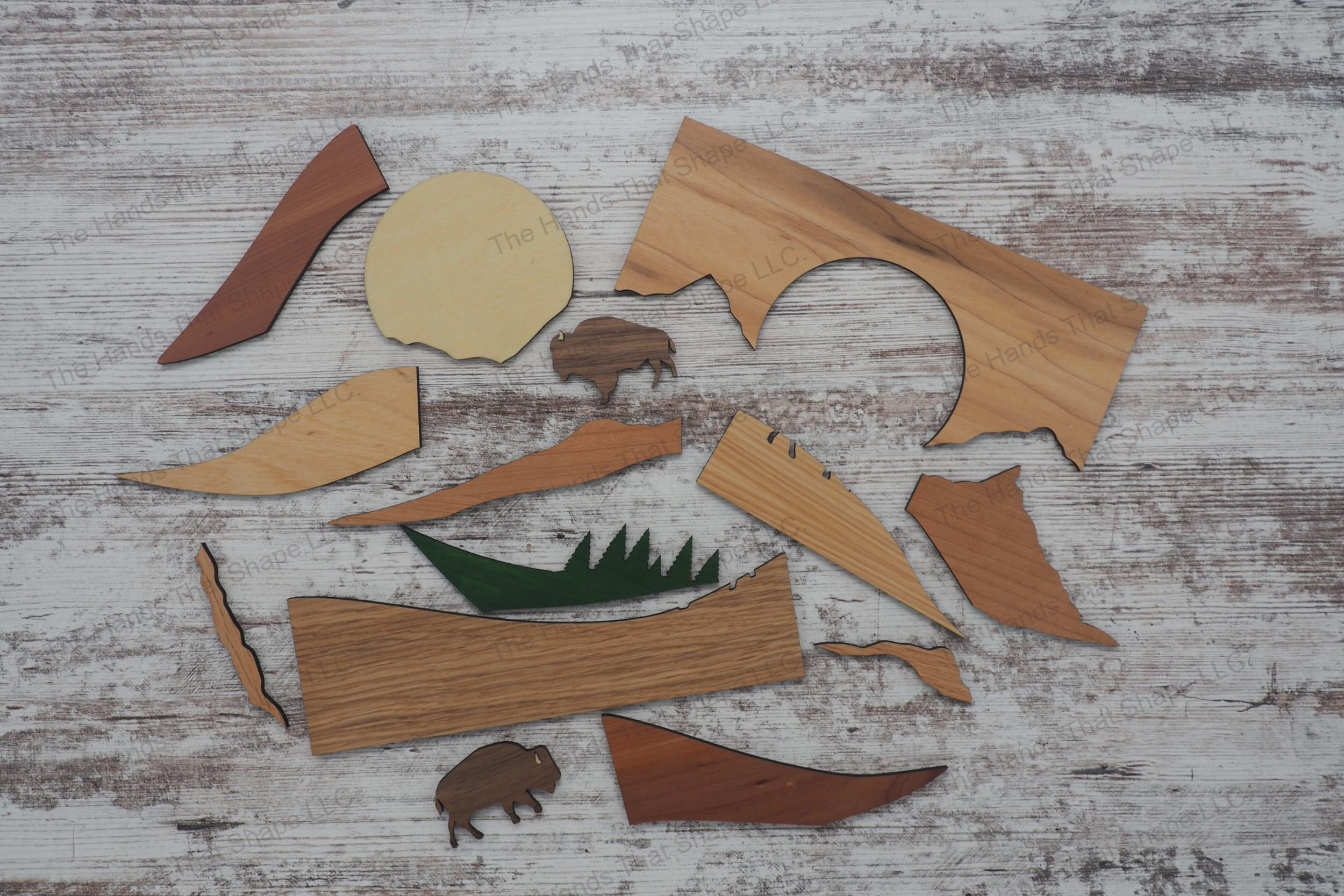 Craft a captivating 3D inlay art piece with our laser-ready design featuring two bison grazing on rolling hills, ideal for shadowbox displays or desktop decor.