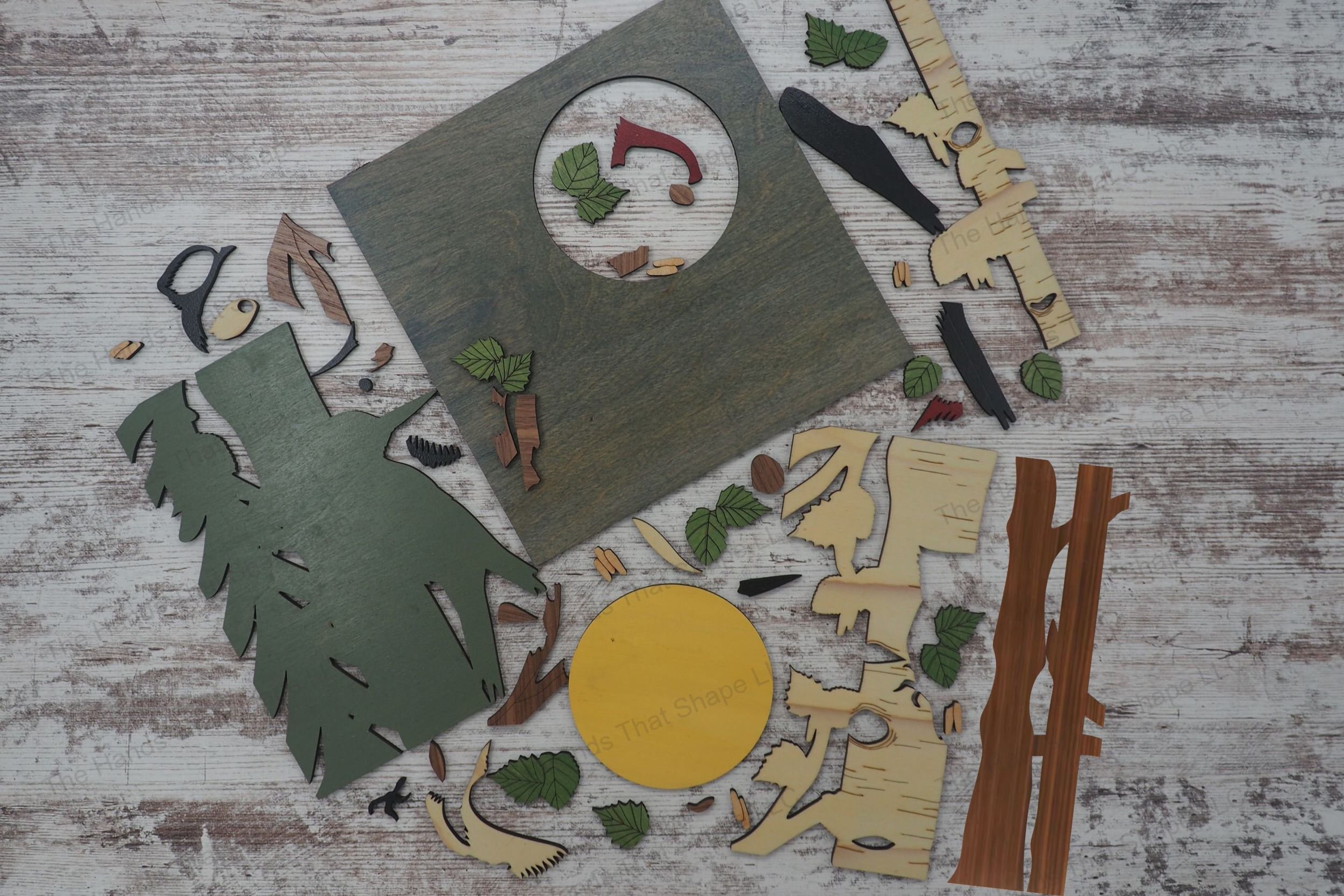 Create a stunning 3D inlay art piece with our laser-ready design featuring a woodpecker on a birch tree, perfect for adding a touch of nature to your home.