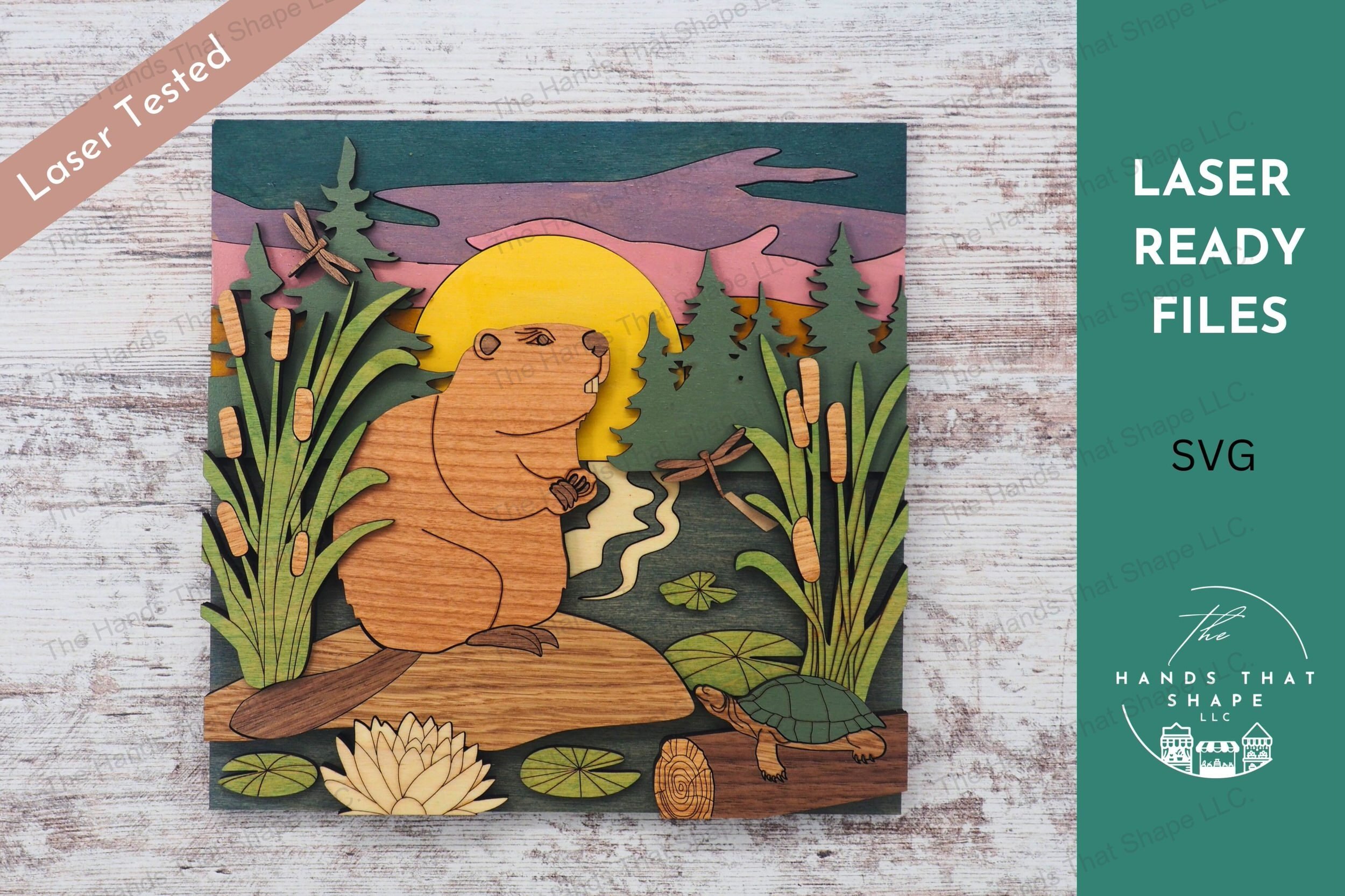 Create a captivating 3D inlay art piece with our laser-ready design featuring a detailed beaver and wetland scene, perfect for enhancing home decor.