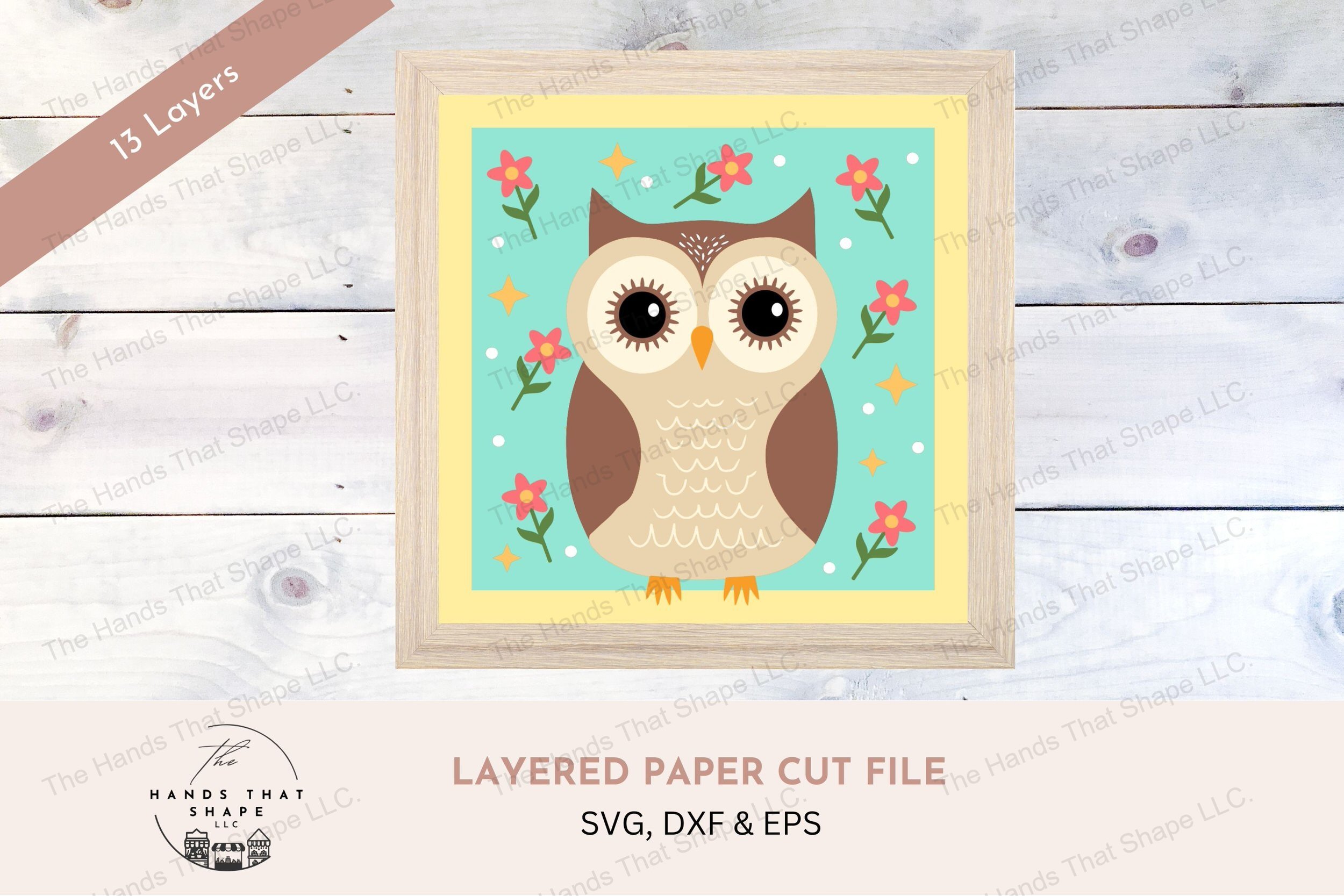 This layered cardstock art piece showcases a folksy owl, standing amidst a setting of flowers, dots, and stars, creating a charming and mystical woodland scene.