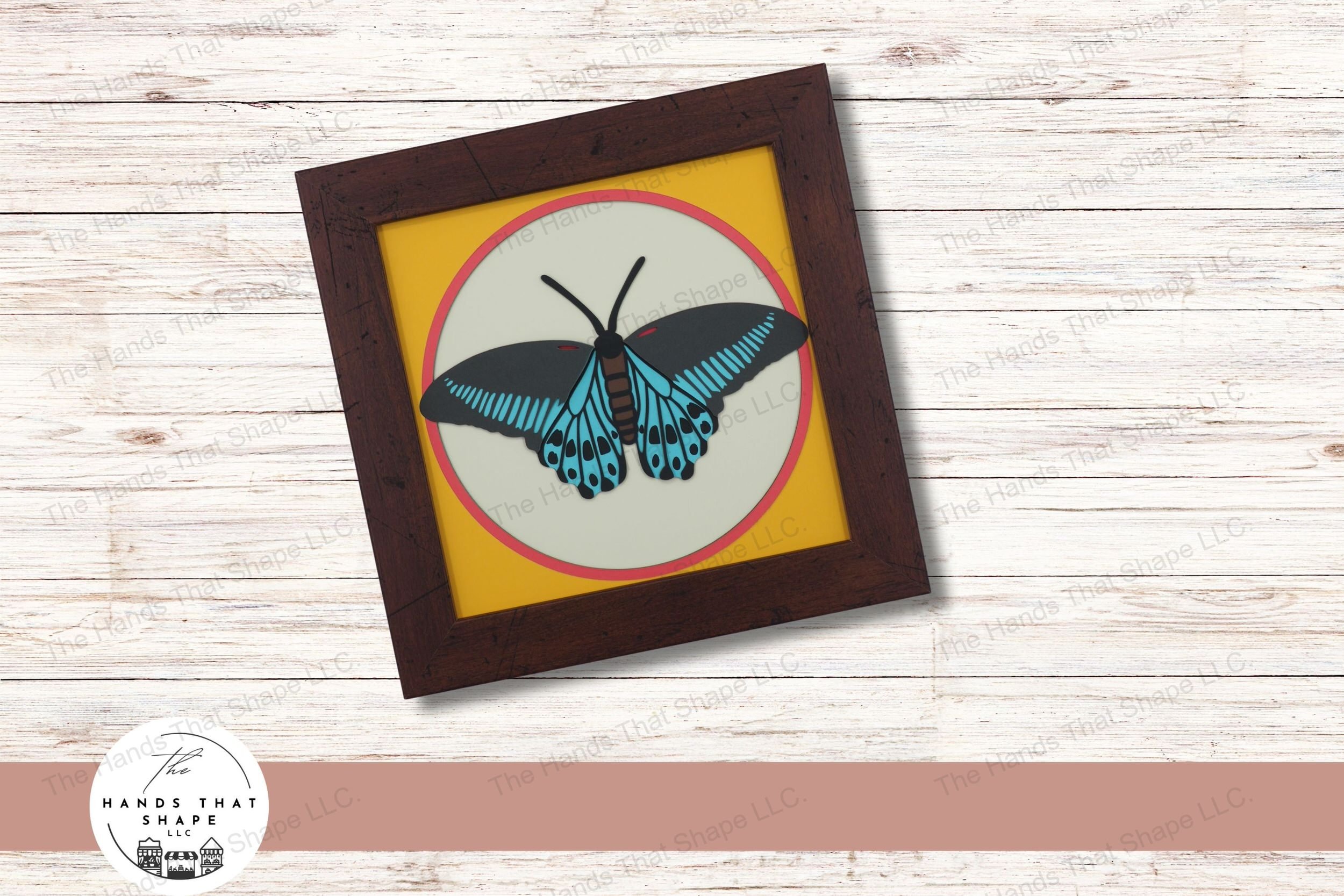 This layered cardstock art piece beautifully captures the striking Blue Mormon Butterfly in full spread, creating a captivating visual display.