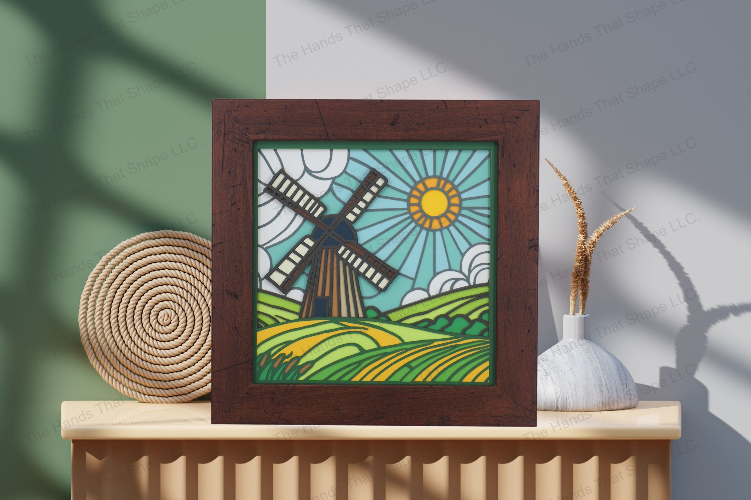 Admire this meticulously crafted old windmill-themed cardstock artwork, displayed on a table, highlighting its layered depth and rustic stained glass charm.