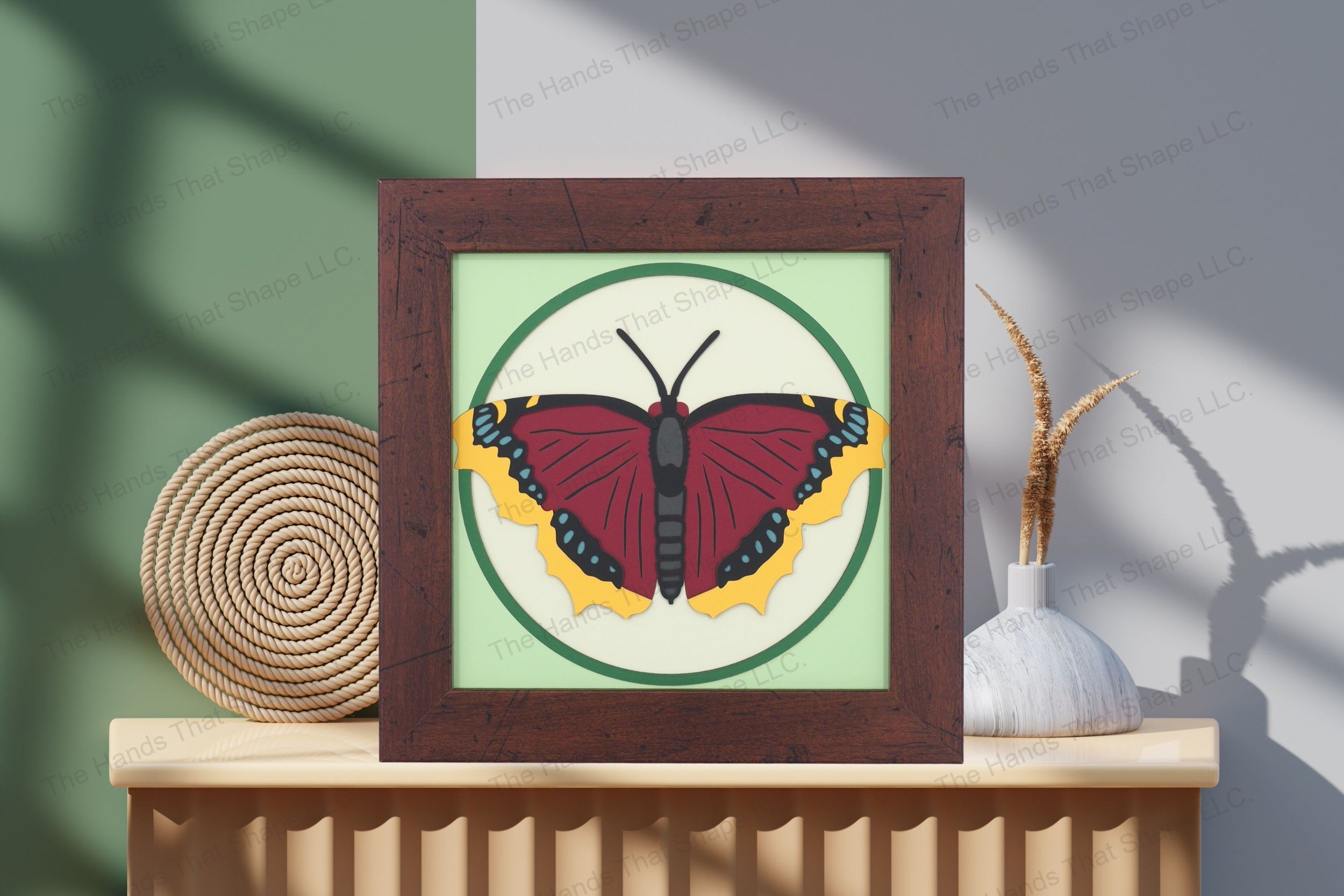 Admire this striking Mourning Cloak Butterfly-themed cardstock artwork, elegantly displayed on a table, highlighting its deep colors and detailed layering.