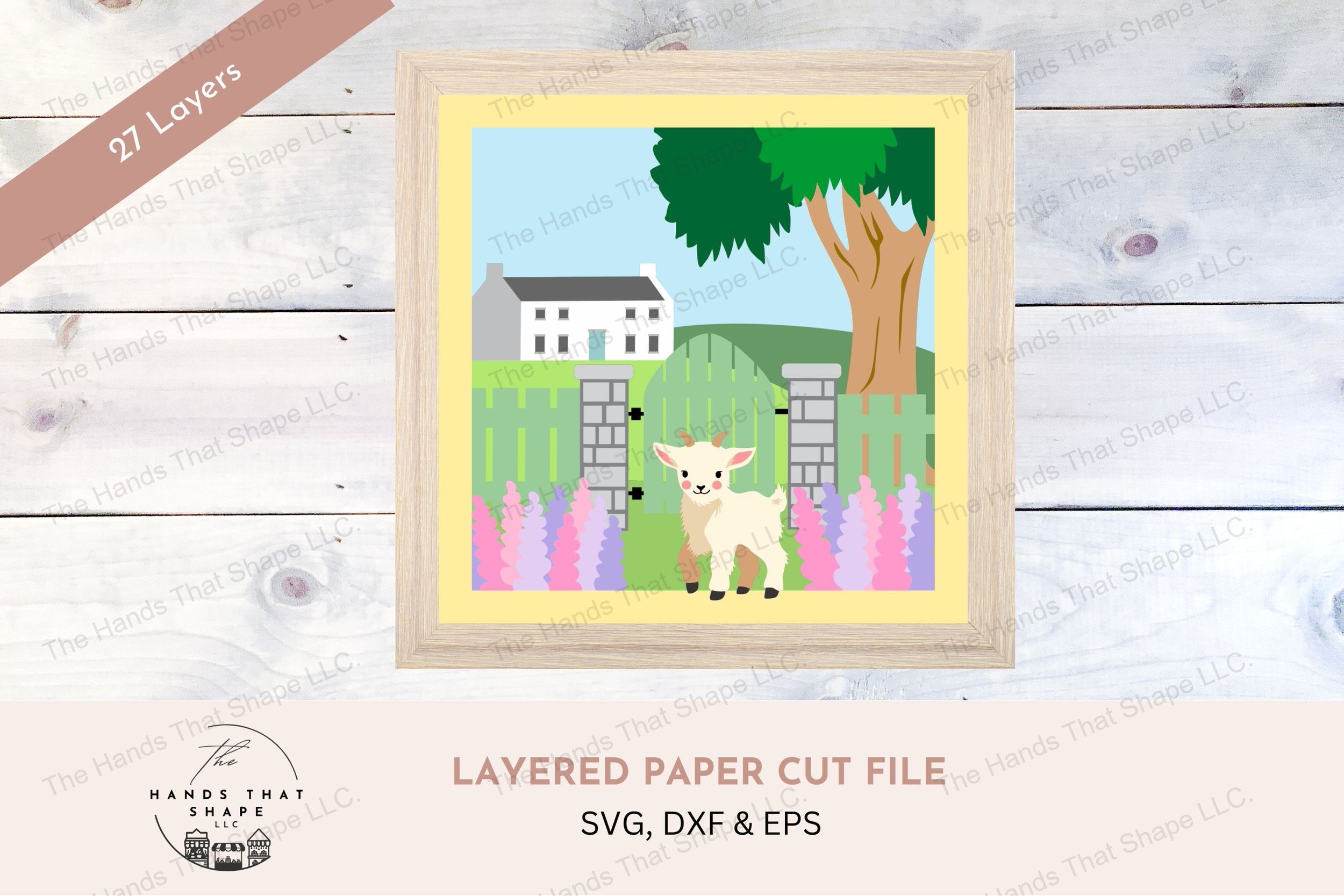 This layered paper art piece portrays a goat amidst hyacinth flowers, with a backdrop of a rustic fence, and grand house, creating a picturesque rural setting.