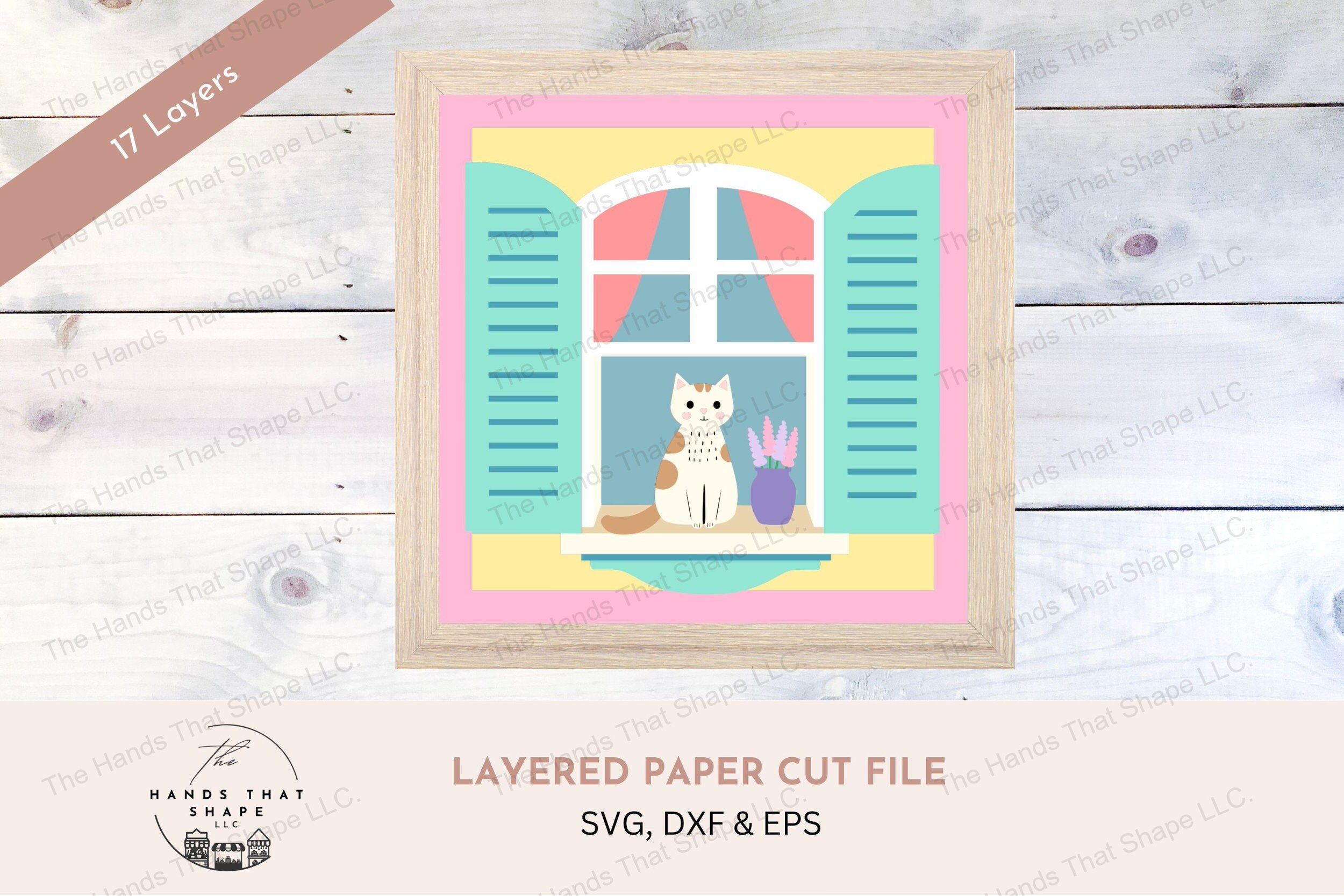 This layered cardstock art piece shows a tranquil scene of a cat sitting on a window sill, offering a glimpse of cozy indoor life from an outdoor perspective.