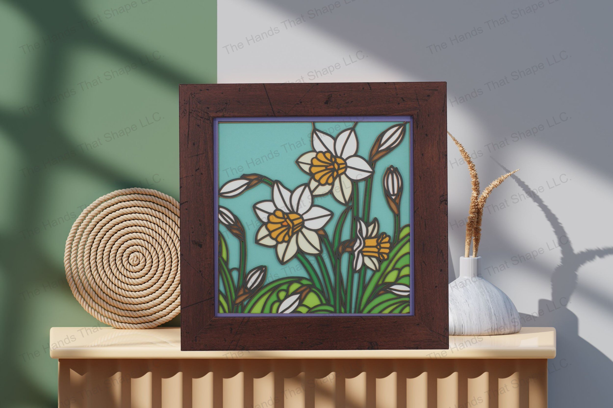 Admire this stunning daffodil-themed cardstock artwork, elegantly displayed on a table, showcasing its vibrant colors and intricate layered design.