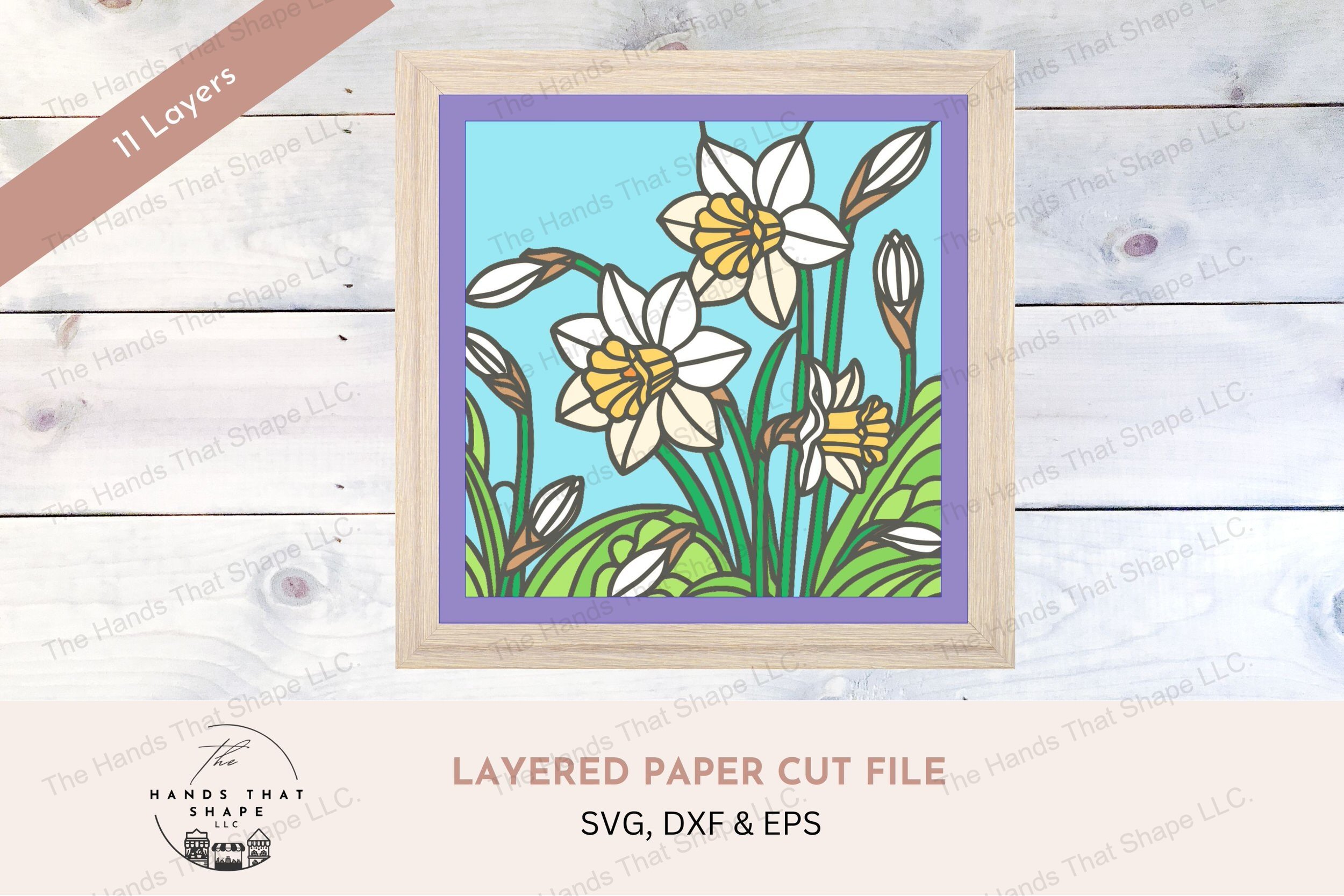 This layered cardstock digital design file beautifully captures multiple daffodils in various stages of bloom, complete with leaves and grasses.