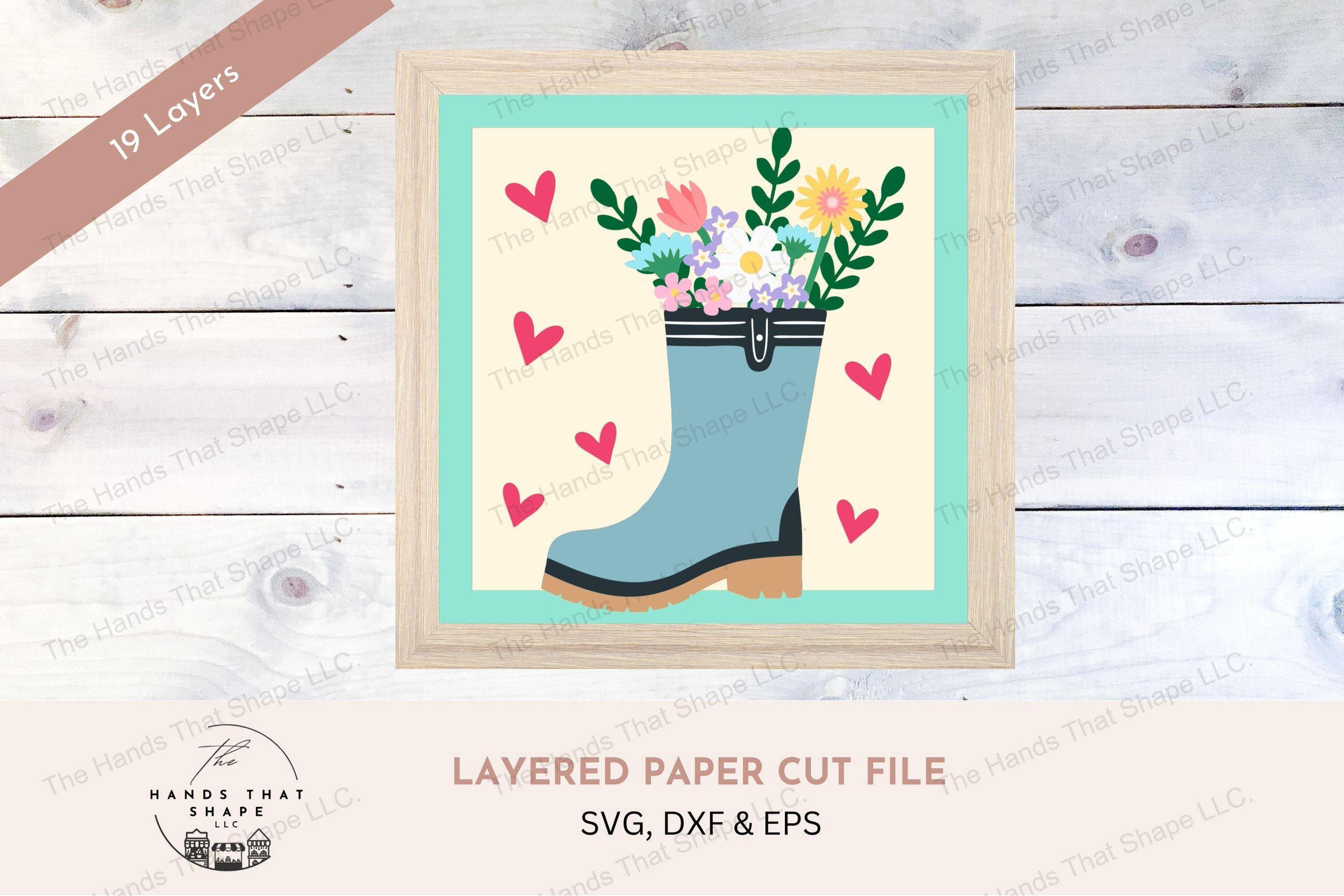 This layered cardstock art piece beautifully captures a colorful spring bouquet in a rainboot, creating a delightful and vibrant celebration of spring.