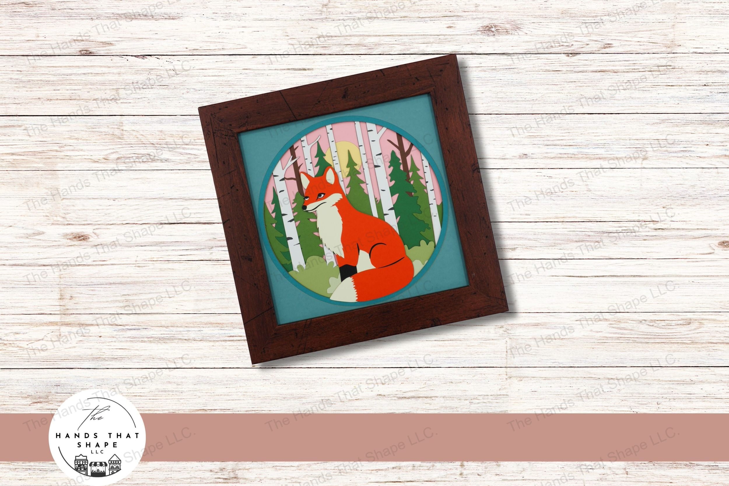 This 3d layered cardstock art piece vividly captures a serene fox sitting amid a birch forest, creating a peaceful and enchanting woodland tableau.