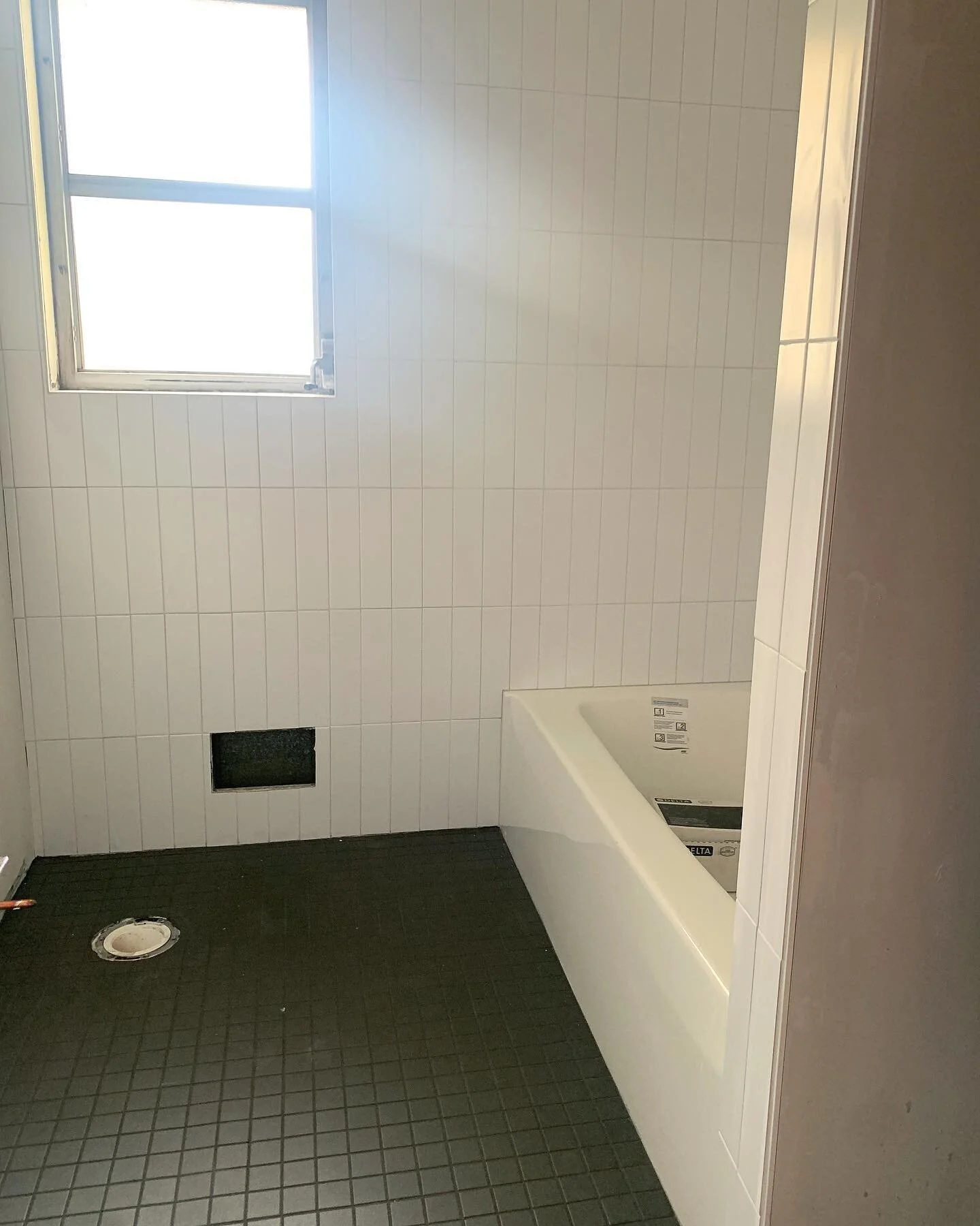 BIG NEWSSSSSS // The bathroom tile is done!! 😅😵😁🥹

(We're been without a finished/fully-funtional full bathroom since we started renovations a year ago and are now THIS CLOSE to having a real bathroom like, as the kids say, &quot;a real family&qu