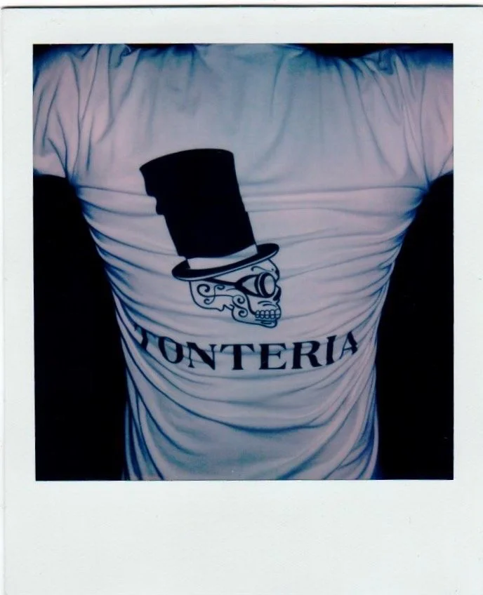 T-shirt with a graphic of a skull wearing a top hat and sunglasses, with the word "VONTERIA" printed below.