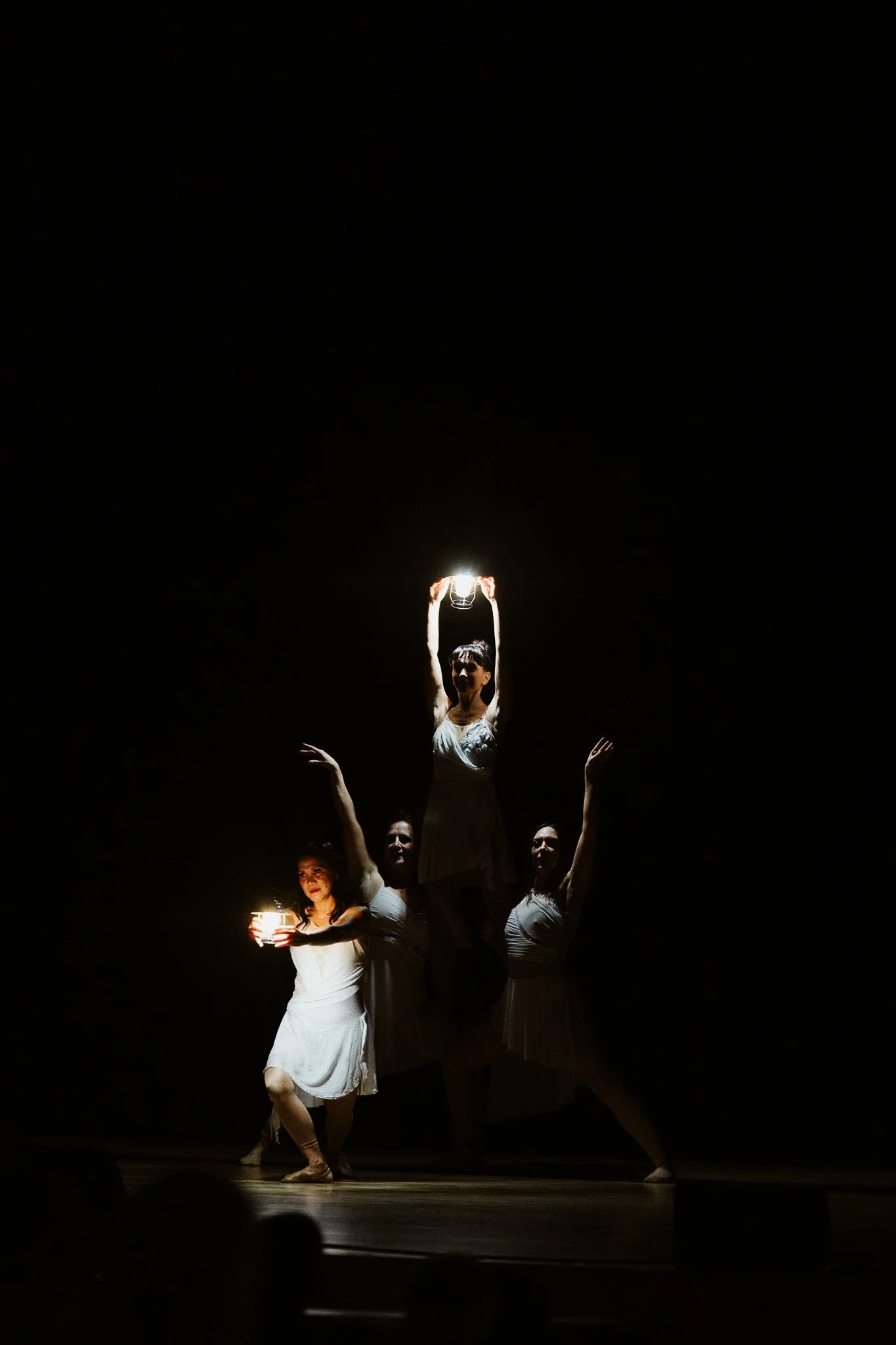 dancing group with light