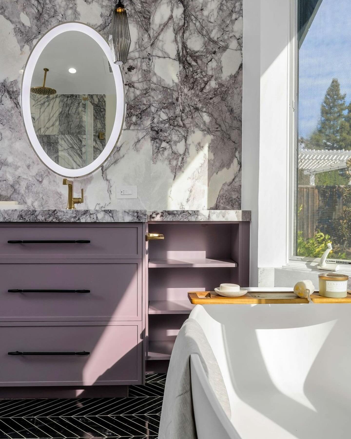 Repost from @designmatters.design
&bull;
Beautiful lilac cabinetry kissed with sunlight! 
*
*
*
Interior Design by Julie Cavanaugh / Photography by Bernardo Grijalva
Signature Custom Cabinetry, All Natural Stone
#bathrooms_of_insta #freestandingtub #