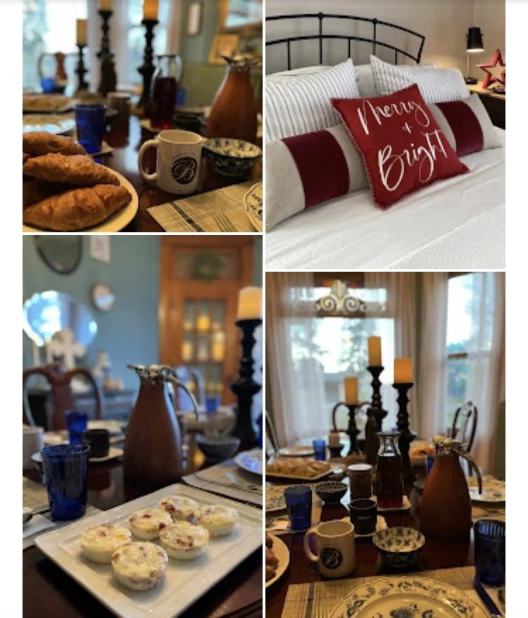 A cozy breakfast and holiday setup with candles, pastries, mugs, and a decorated bed with 'Merry & Bright' pillows.