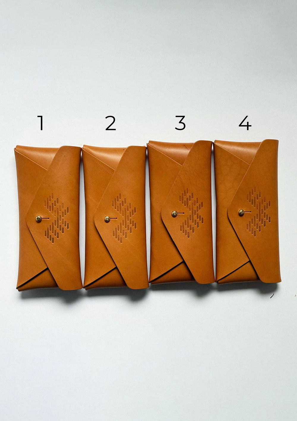 Aleks-Byrd-Hide-and-Hammer-Leather-Envelope-Clutch-bag-seconds-bags1-4-fronts-numbered-Aleks-Byrd-Designs-web.jpg
