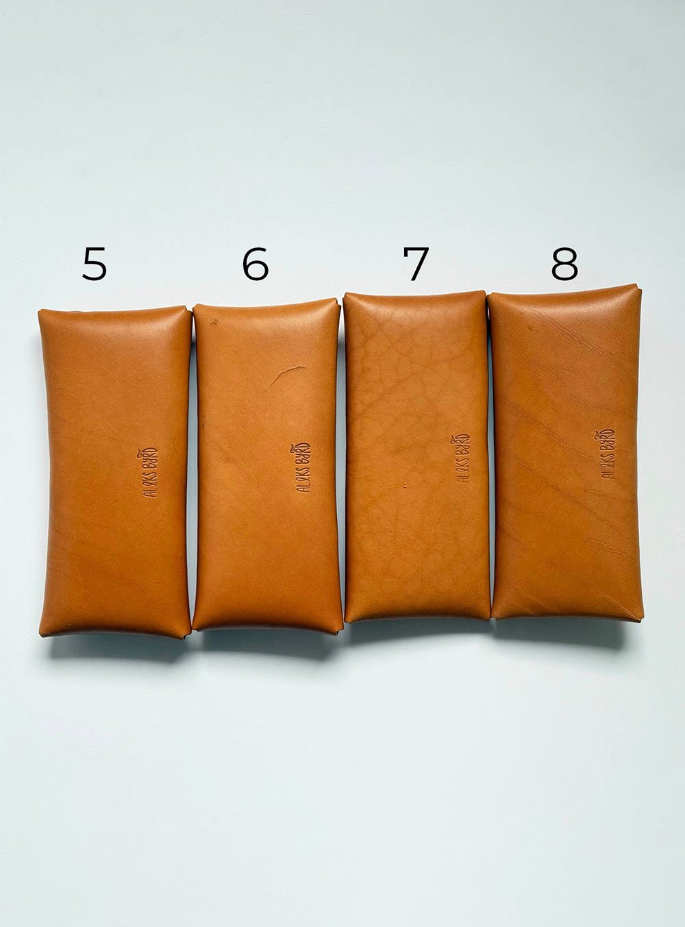 Aleks-Byrd-Hide-and-Hammer-Leather-Envelope-Clutch-bag-seconds-bags5-8-backs-numbered-Aleks-Byrd-Designs-web.jpg