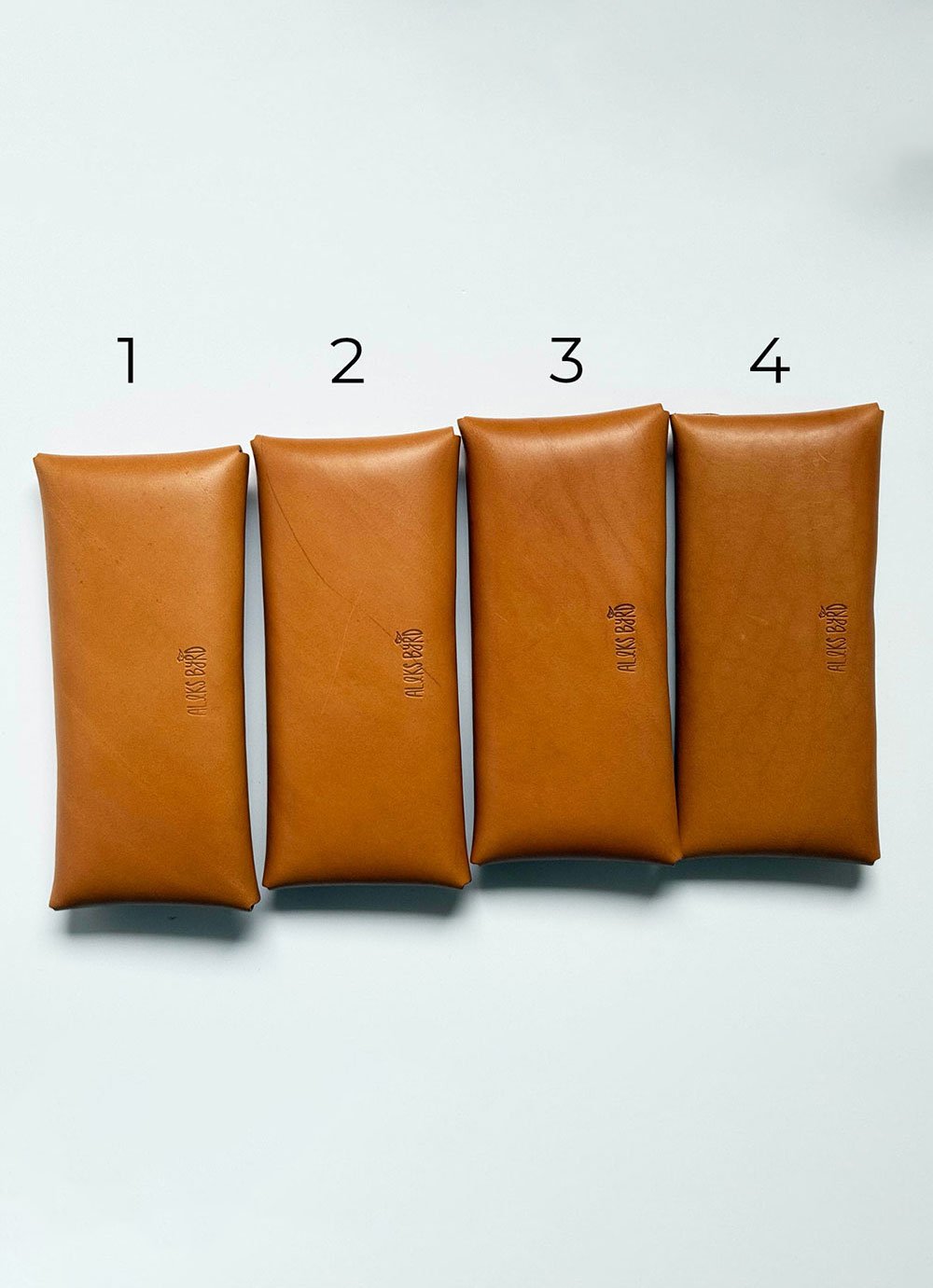Aleks-Byrd-Hide-and-Hammer-Leather-Envelope-Clutch-bag-seconds-bags1-4-backs-numbered-Aleks-Byrd-Designs-web.jpg