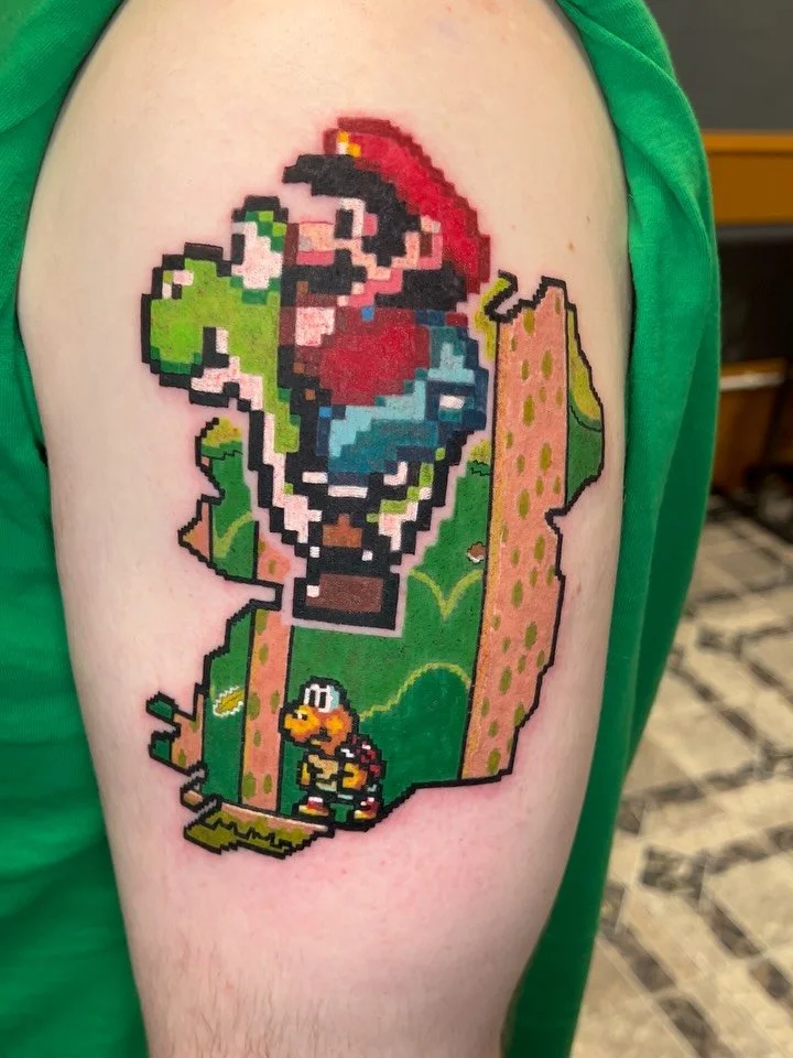 Cool Mario and Yoshi piece for Chris today! His first tattoo as well, what a sitter 👊🏻 

Loved doing this! 

#mario #supermario #nintendo #tattoo #tattooartist