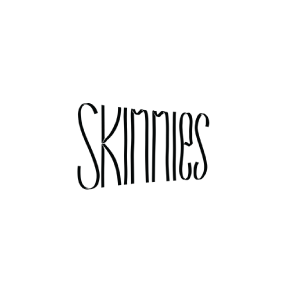 A black t-shirt with the word 'SKATES' printed vertically in blue text.