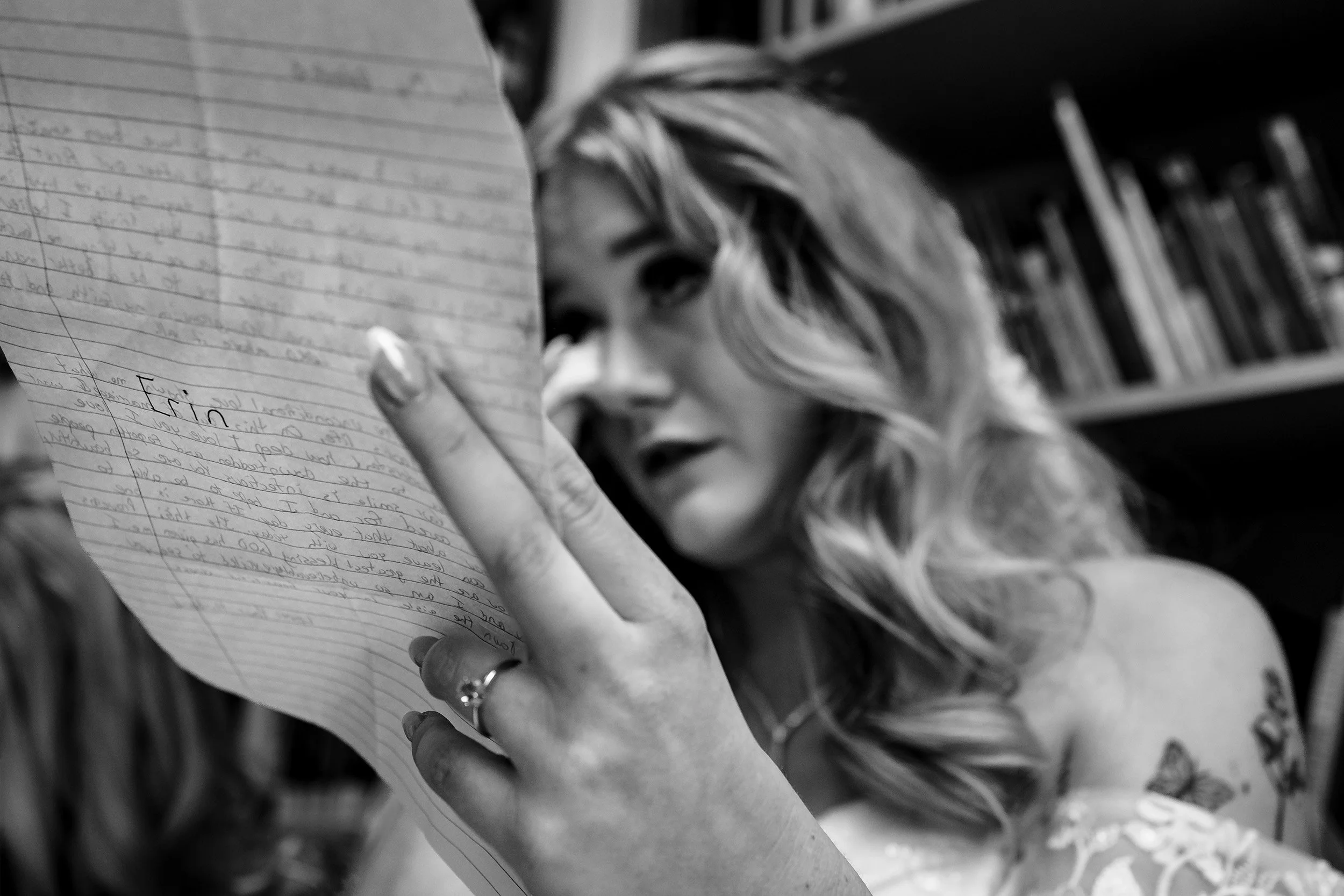 Bride wipes tears as she read letter at Bonnyville Alberta Wedding 
