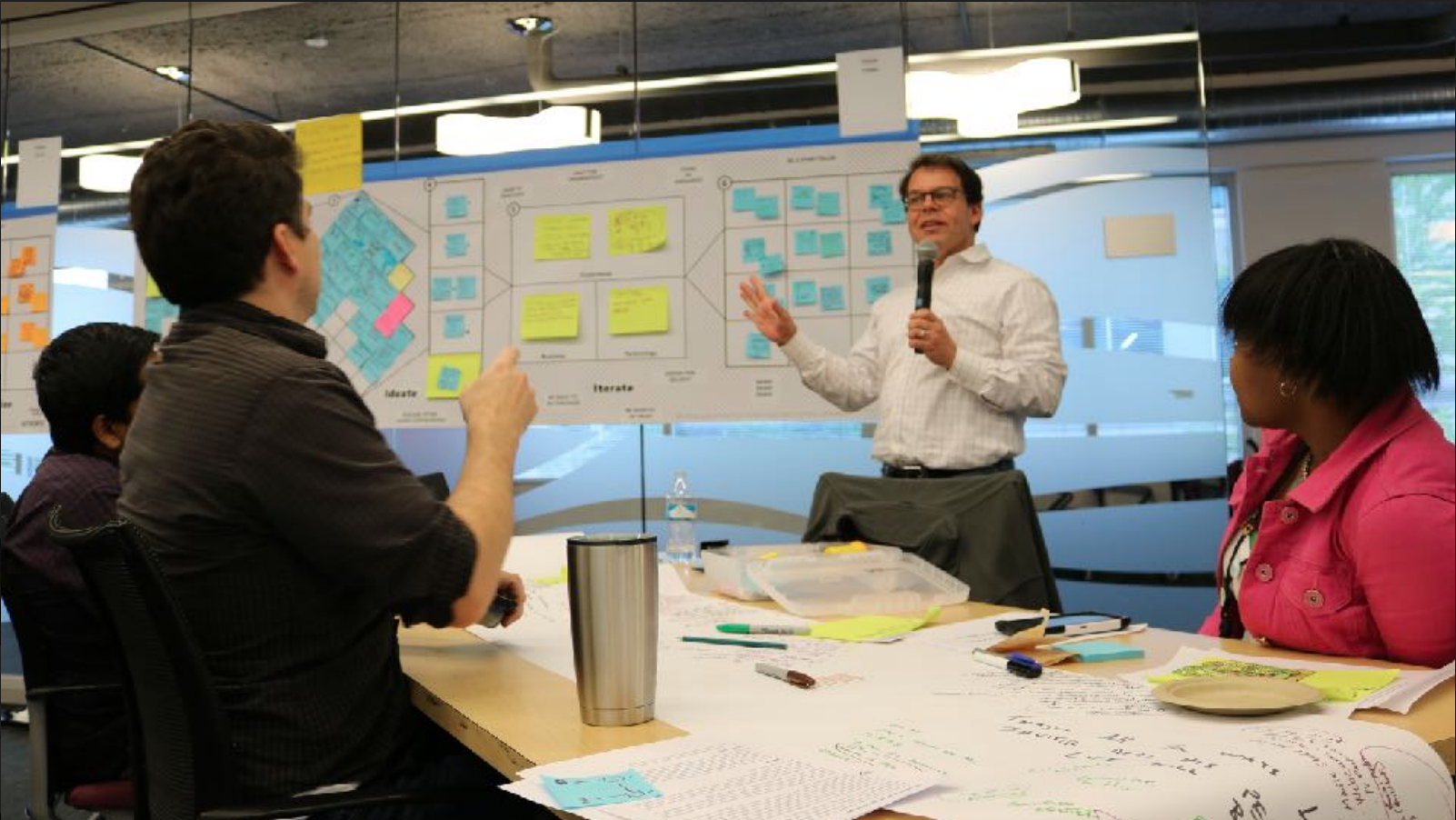 Man presenting from Design Swarm canvas