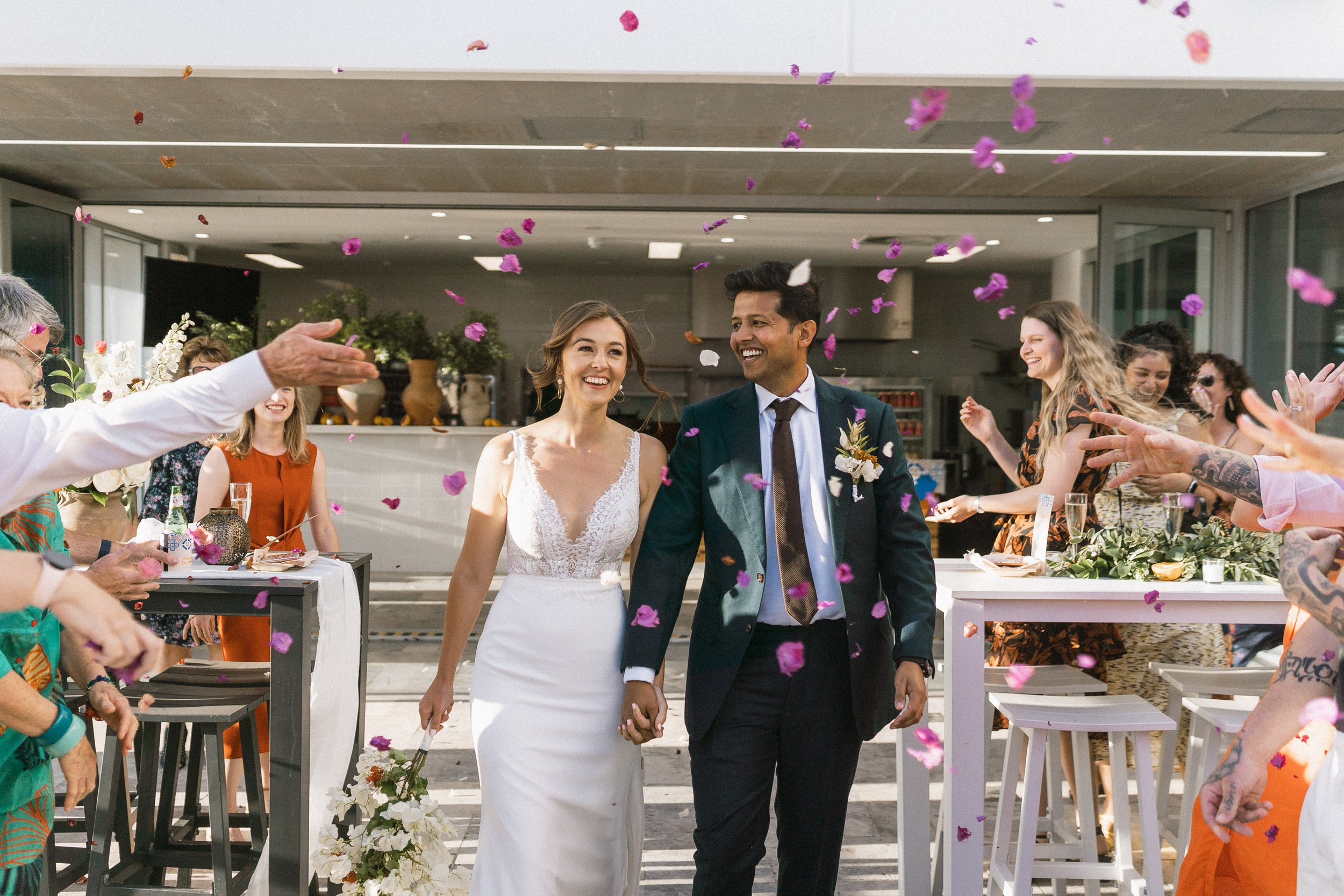 Bride and Groom Entrance, Flower Petal Confetti, Courtyard Coastal Reception Venue, Perth wedding planner, South Spain inspired wedding