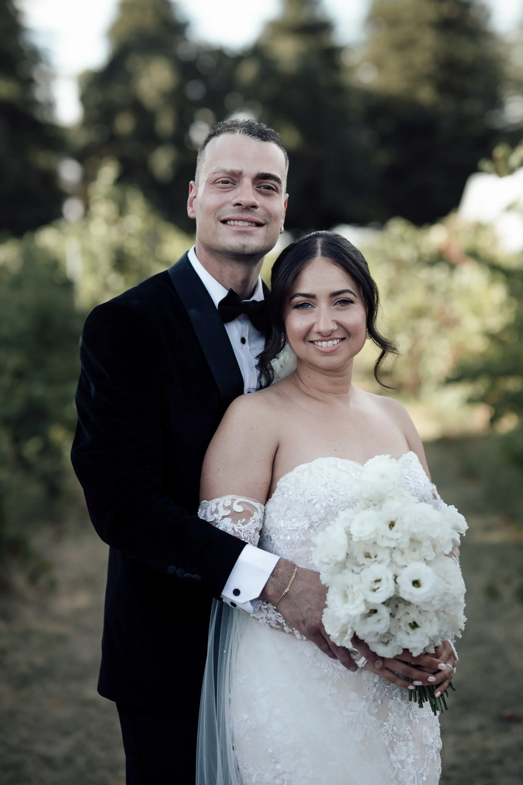 Caitlin and Michael photographed in the vineyards at Nikola Estate during their Swan Valley wedding.