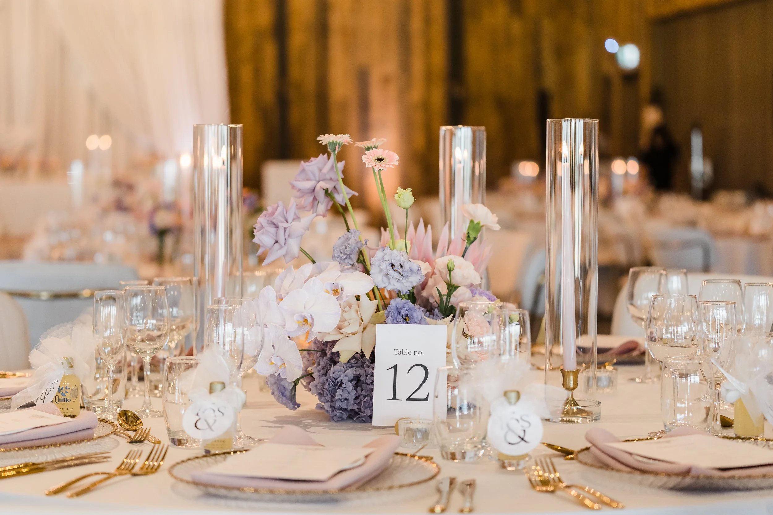 Gold-accented wedding table styling with blush napkins, pastel florals, custom stationery at Sandalford Estate, Swan Valley
