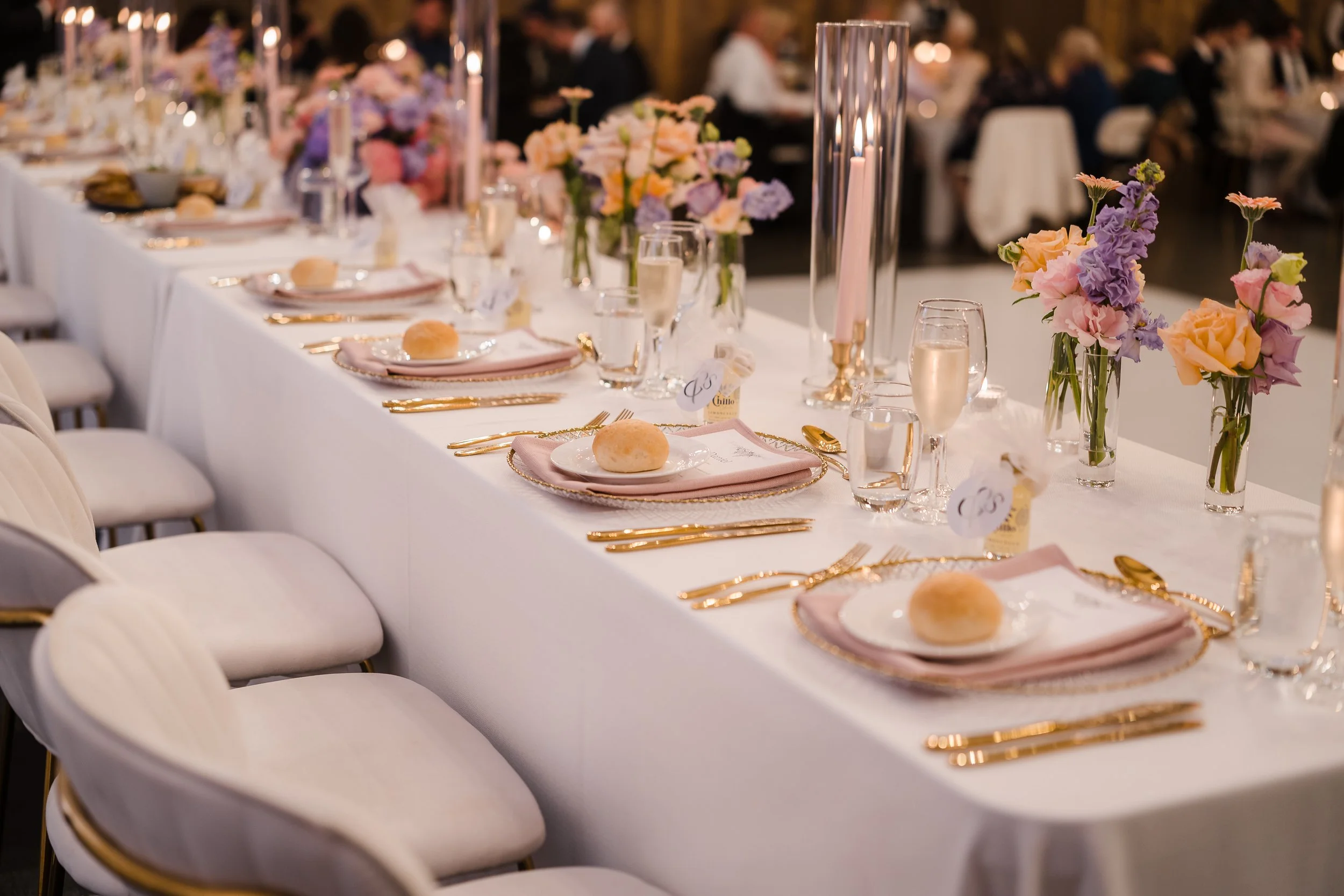 Gold-accented bridal table styling with blush napkins, pastel florals, custom stationery at Sandalford Estate, Swan Valley