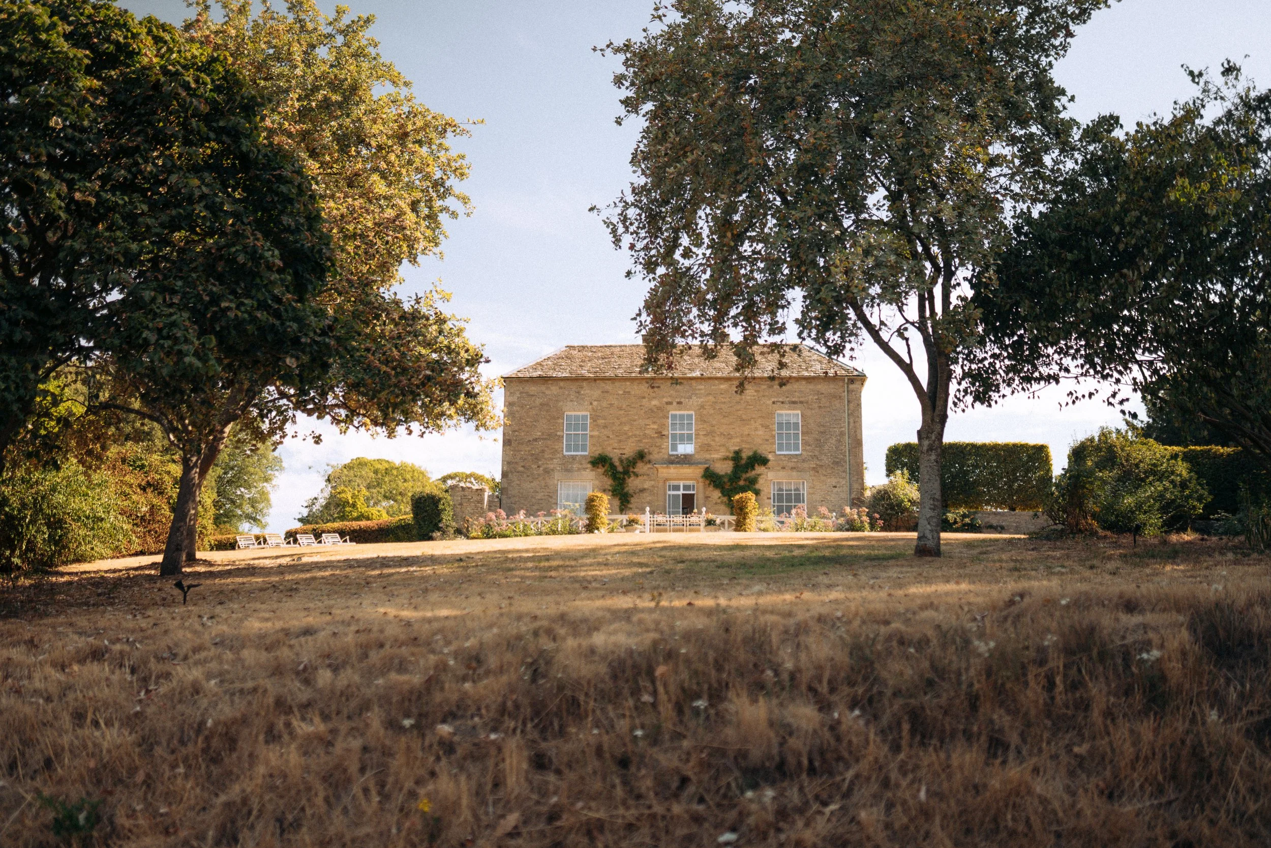 Honey-stone country house exterior at Friars Well, Aynho