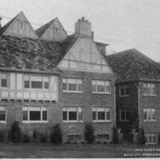 Anhalt Apartments, 
1320 Queen Anne Ave

99 years ago Frederick Anhalt, Seattle's best-known apartment builder, designed this Queen Anne Avenue apartment in his more typical Tudor style. Built in 1927, Anhalt aimed to be different from other develope