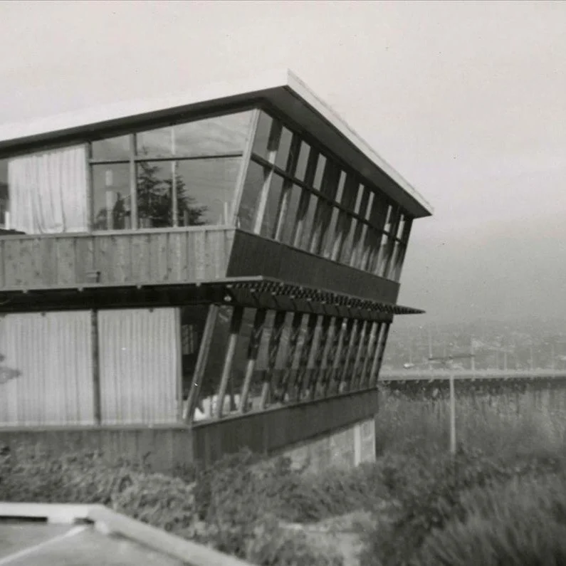 My how the greenery has grown.

Canlis opened on December 11, 1950, founded by pioneering restaurateur Peter Canlis.at the south end of the Aurora Bridge. 
Designed by regional mid-century modern architect Roland Terry, featuring a unique edge-of-the