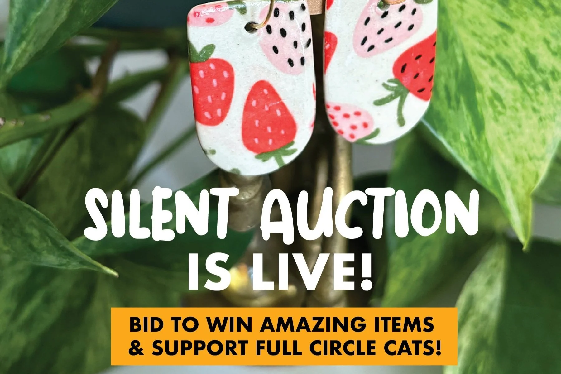 10th Anniversary Online Auction text with strawberry earrings