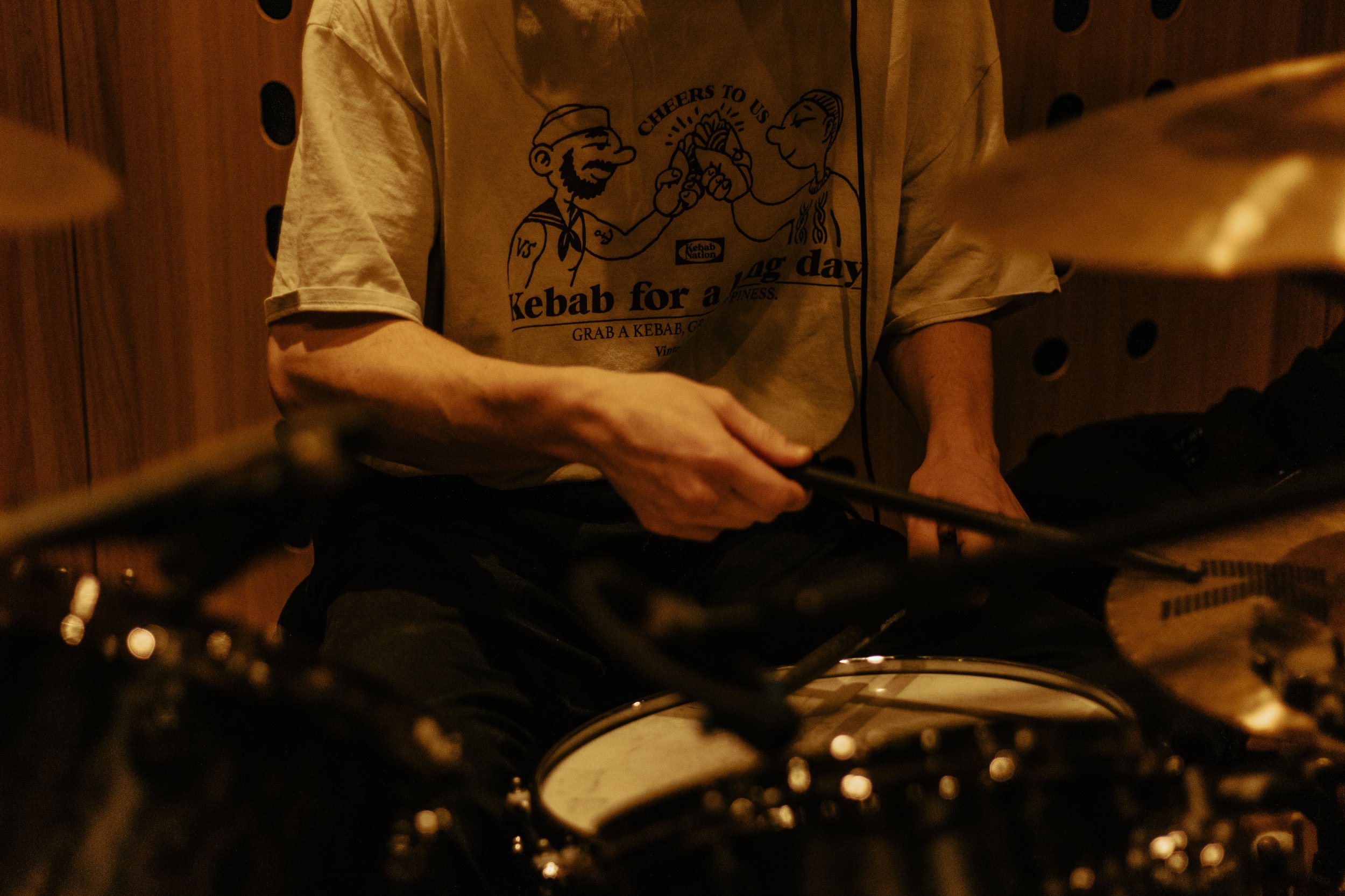 Groove in the Making: Witness the rhythmic essence of music coming to life during a drum recording session. Our lens captures the precision and passion that goes into every beat. Step into the heart of the music-making process with us.