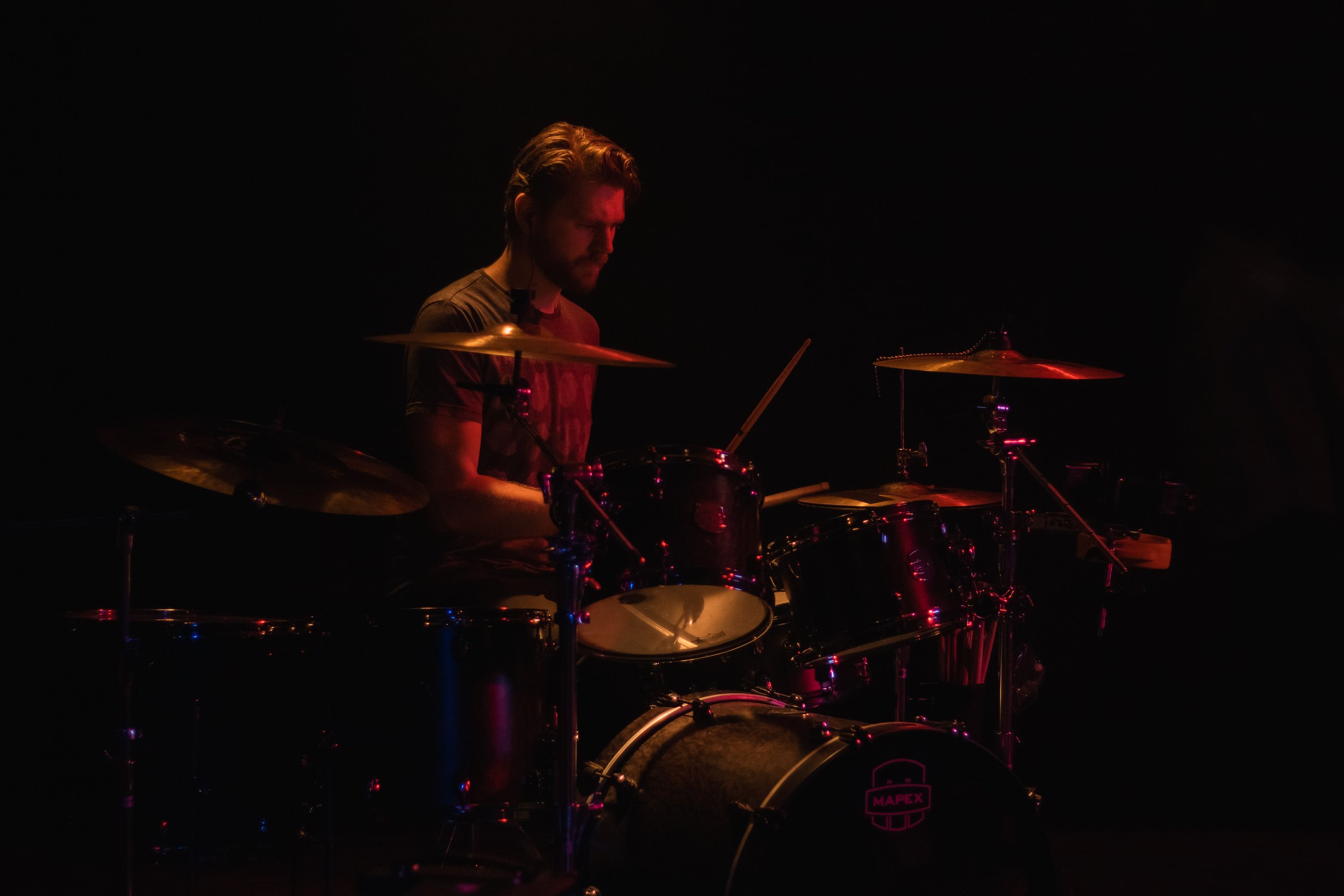 Captured the electric energy of The Maple Verse in a mesmerising live performance. Our band photography brings the stage to life, highlighting the passion and talent of this exceptional musical ensemble. Book us to make your moments on stage unforget