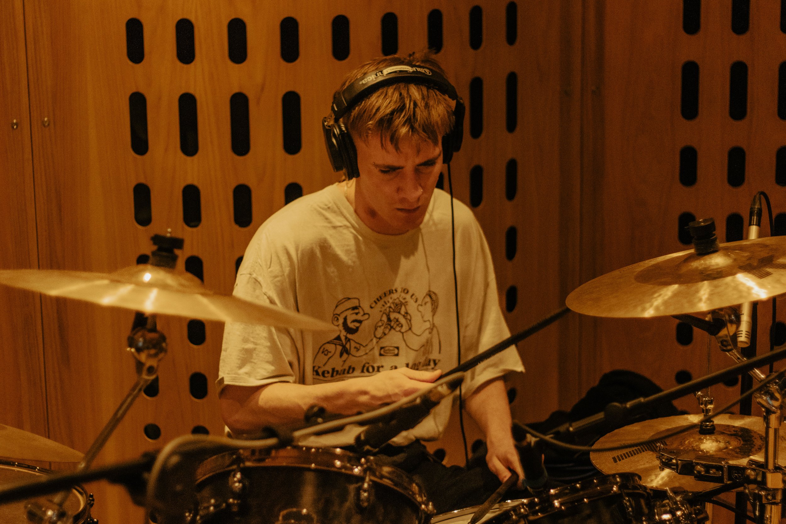 Groove in the Making: Witness the rhythmic essence of music coming to life during a drum recording session. Our lens captures the precision and passion that goes into every beat. Step into the heart of the music-making process with us.