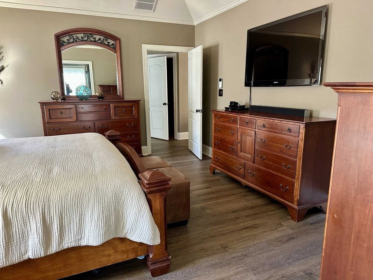 Use the arrows to browse a Bob Timberlake California king bedroom set, a queen bed, and additional bedroom furnishings.