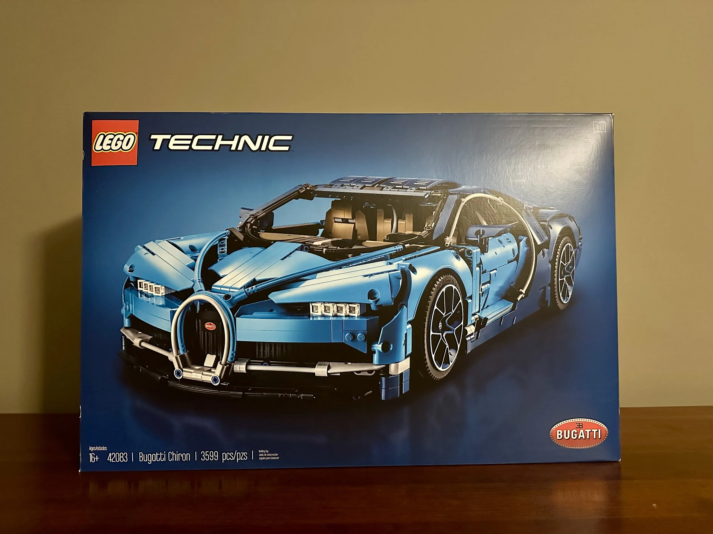 $400 — Brand new LEGO Technic Bugatti Chiron (Set 42083), factory sealed and retired. | One of LEGO’s most detailed Technic builds. Features include: • W16 engine with moving pistons • 8-speed gearbox • Suspension system • Detailed Bugatti design ele