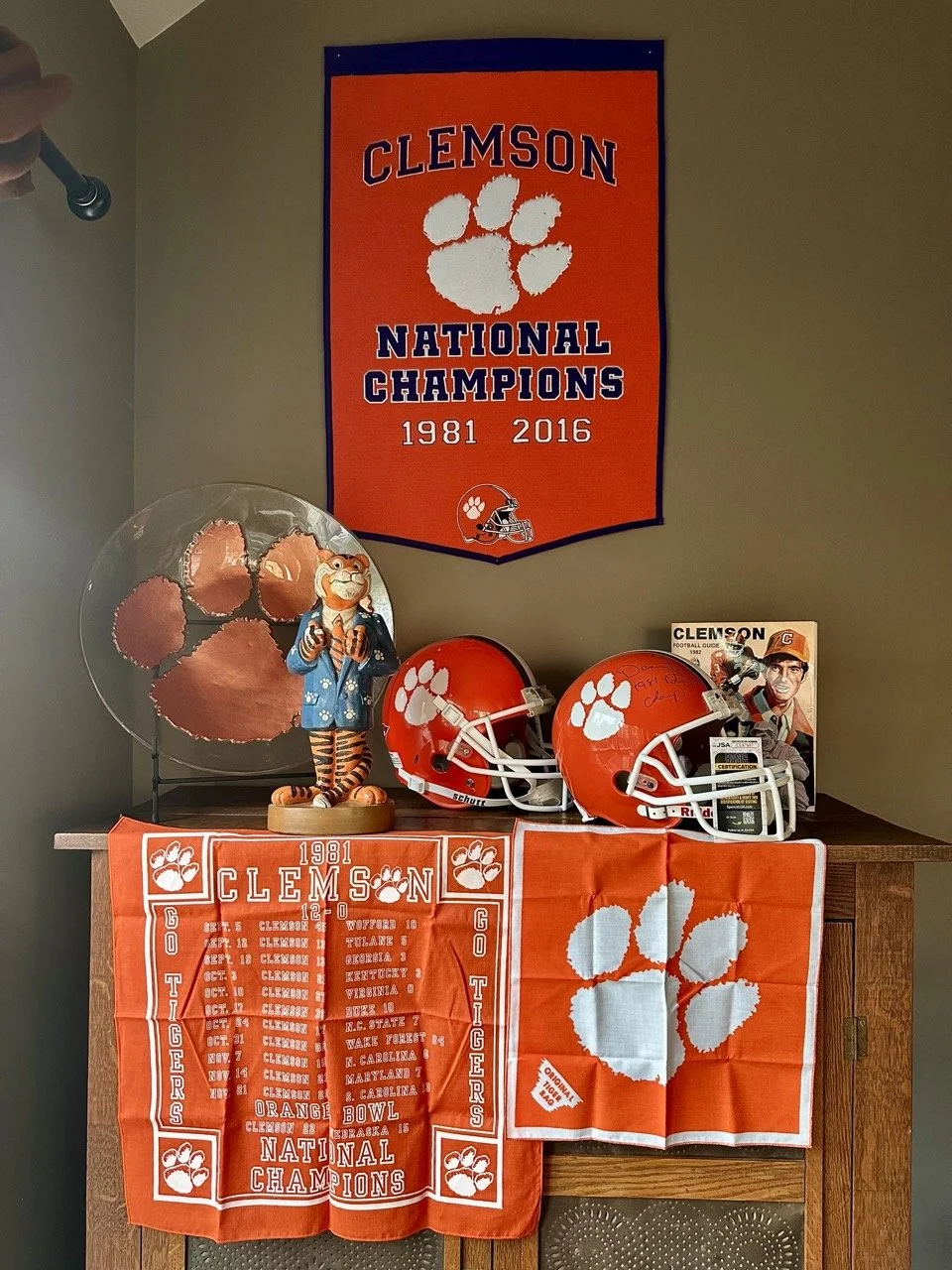 Use the arrows to browse Clemson memorabilia, including authenticated autographed collectibles and items from the 1981 National Championship year.