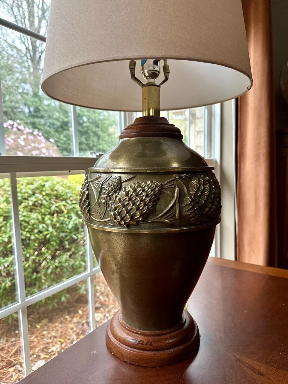 $95 — Bob Timberlake Pinecone Table Lamp (Signed on base) | Metal body with pinecone relief detail | Dimensions: 29” tall (to top of finial), 14” diameter shade (included)
