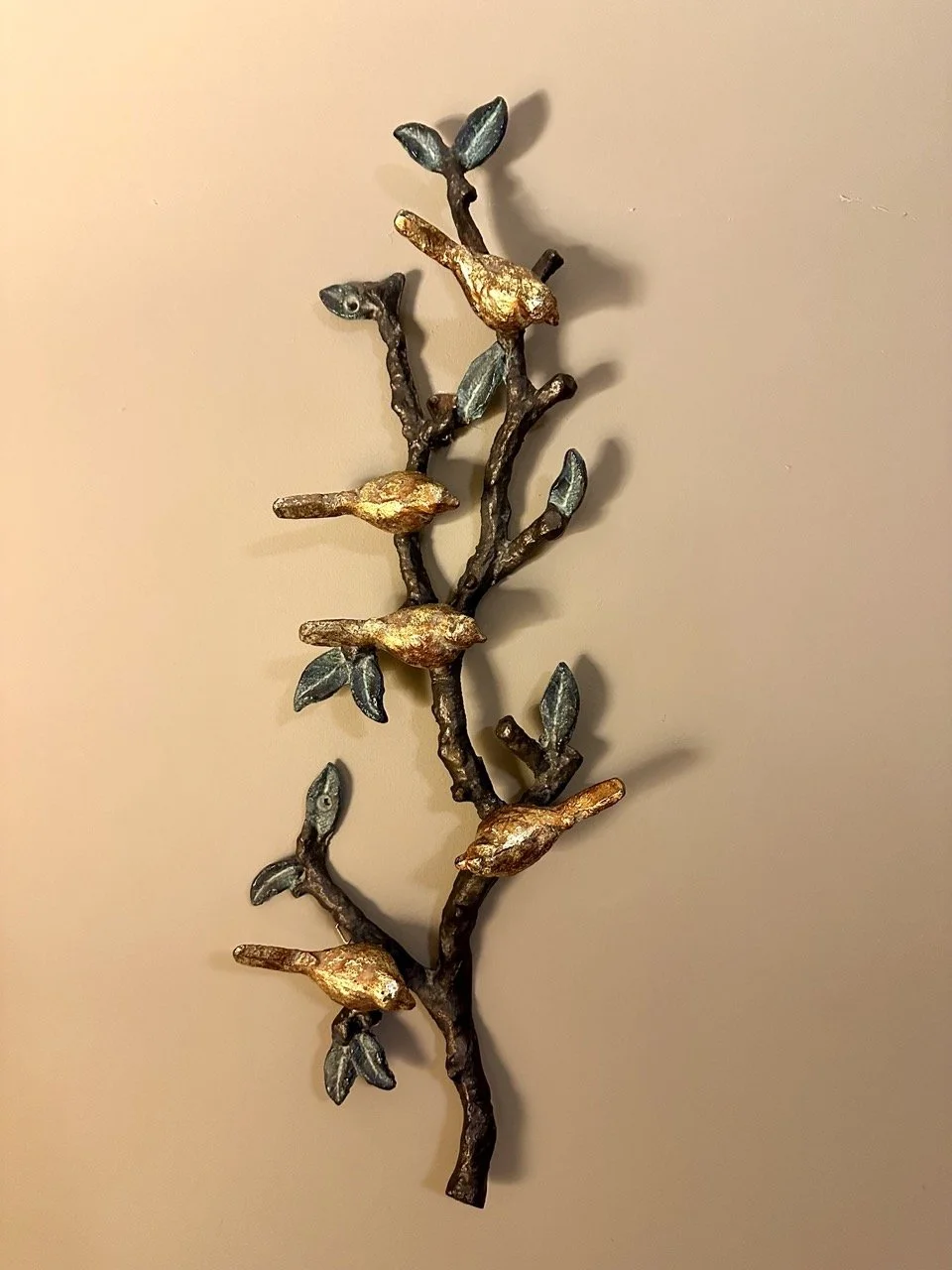 $40 • Metal Bird Wall Sculpture (23.5” x 8.5”) • Branch design with gold birds and leaf detail. Can hang or display flat. Excellent condition.