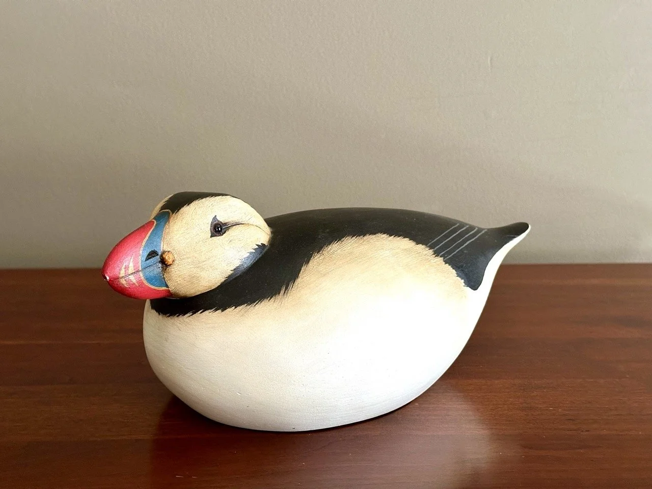$110 • Hand-Carved Atlantic Puffin Decoy by Jim Keffer (Limited Edition 21/50) • Hollow hand-carved and painted decoy from Union, Maine (2005), signed and numbered, beautifully balanced folk art piece with strong collector appeal • Dimensions: 12” L 