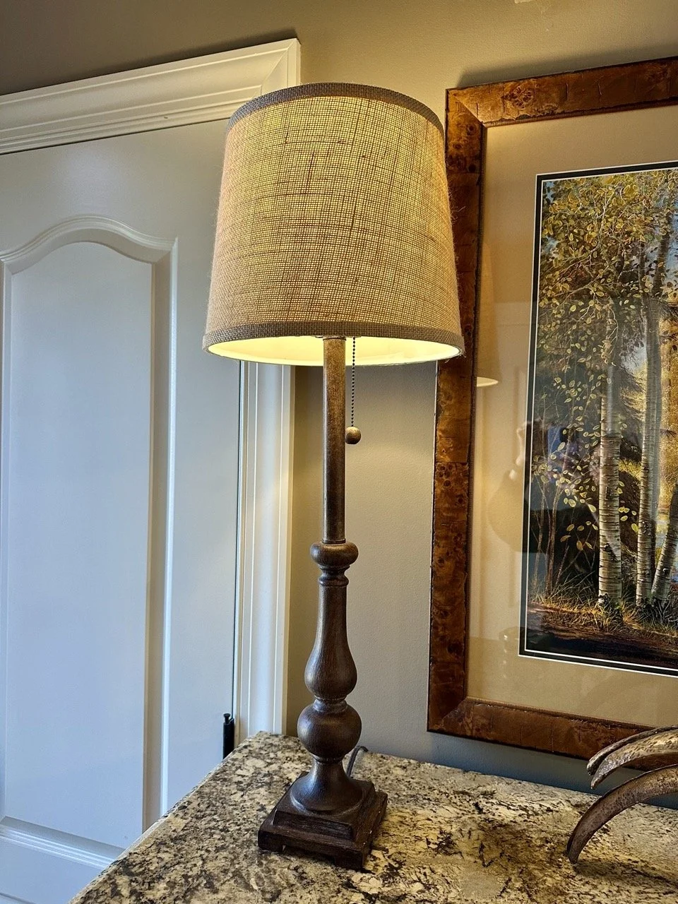 $30 - Neutral Table Lamp w/ Textured Shade | Simple, versatile table lamp with wood-look base and neutral textured shade (included). | Dimensions: Height: 29.5”, shade diameter: 11”