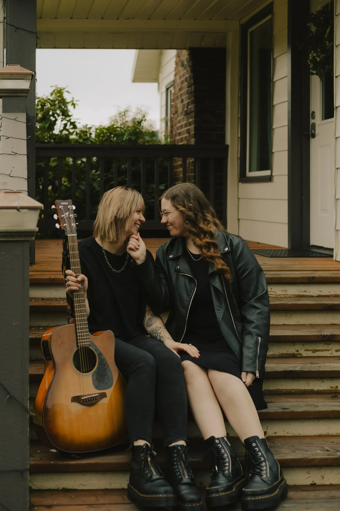 couple-smiling-with-guitar-in-washington-forest.jpg
